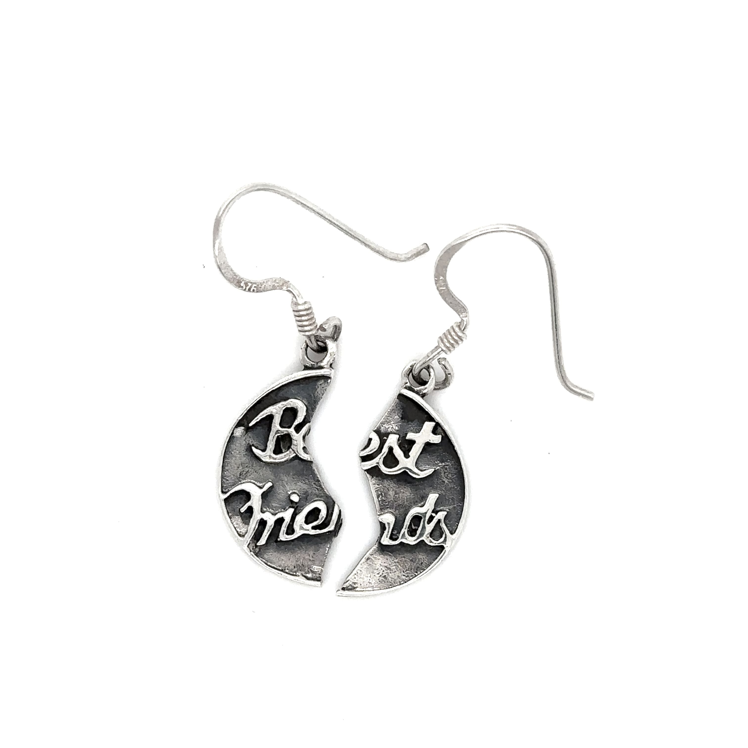 Shareable earrings with the words "best friends" on them can be replaced with Reversible "Best Friend" Earrings from the brand Super Silver.