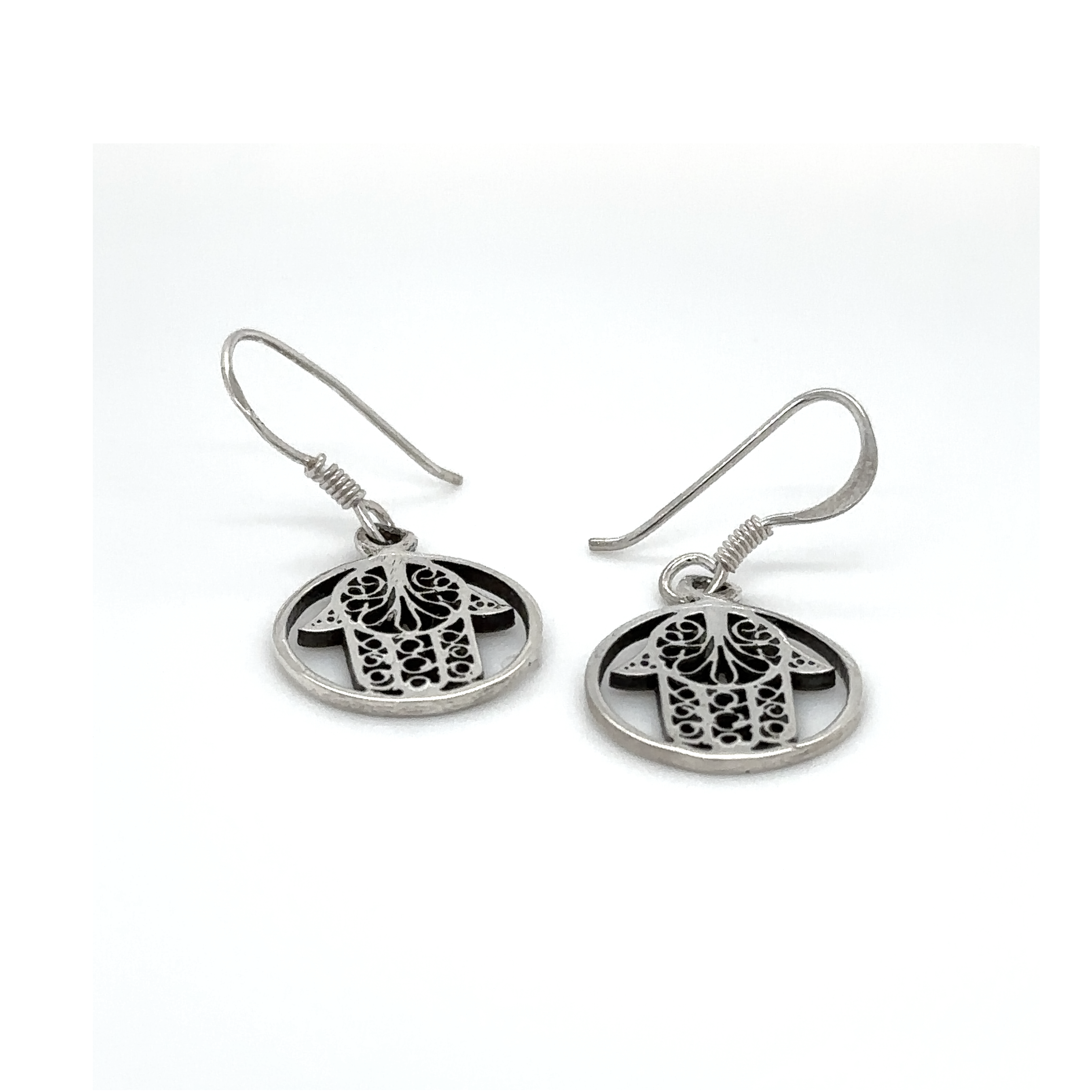 A pair of Hamsa Hand In Open Circle Earrings by Super Silver with an image of an owl on them.