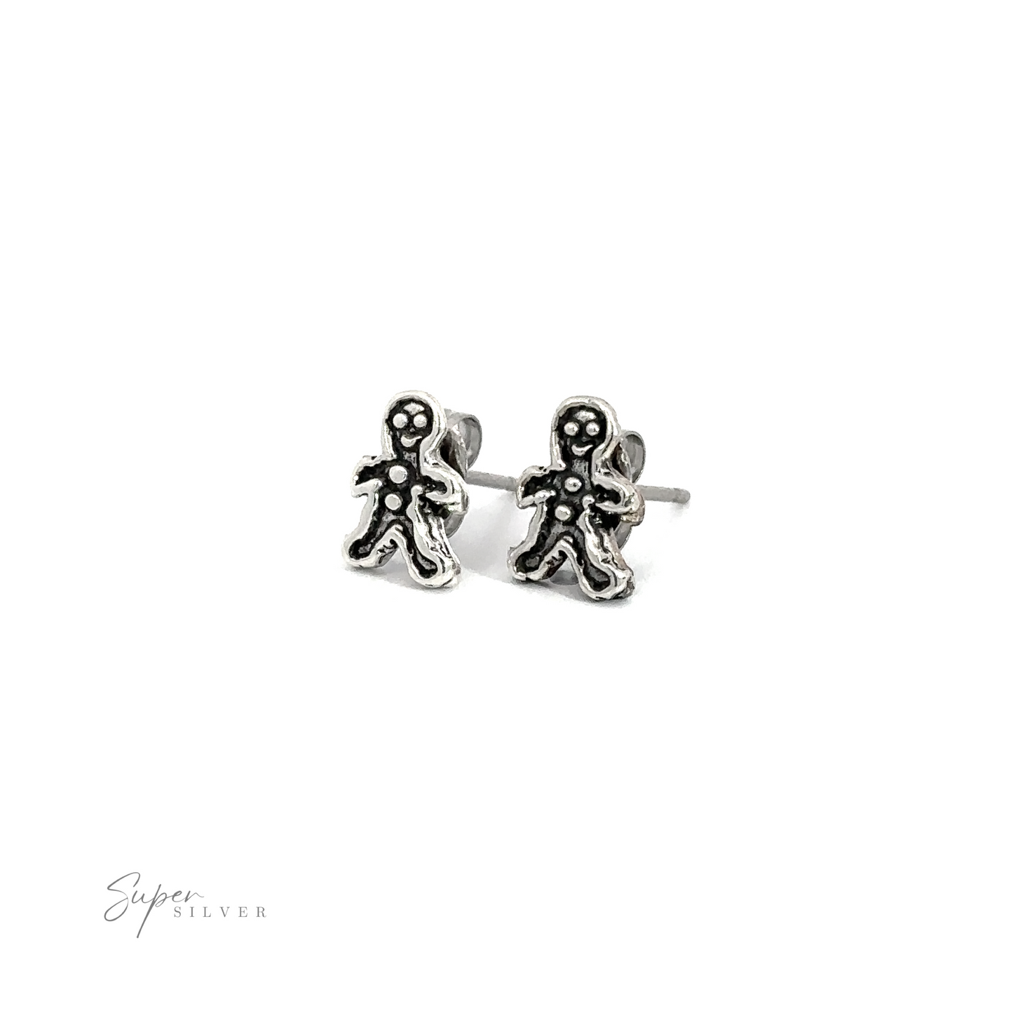 Elevate your festive attire with these charming Gingerbread Man Studs. These silver earrings are adorned with adorable Gingerbread Man Studs, adding a touch of holiday spirit to your outfit.