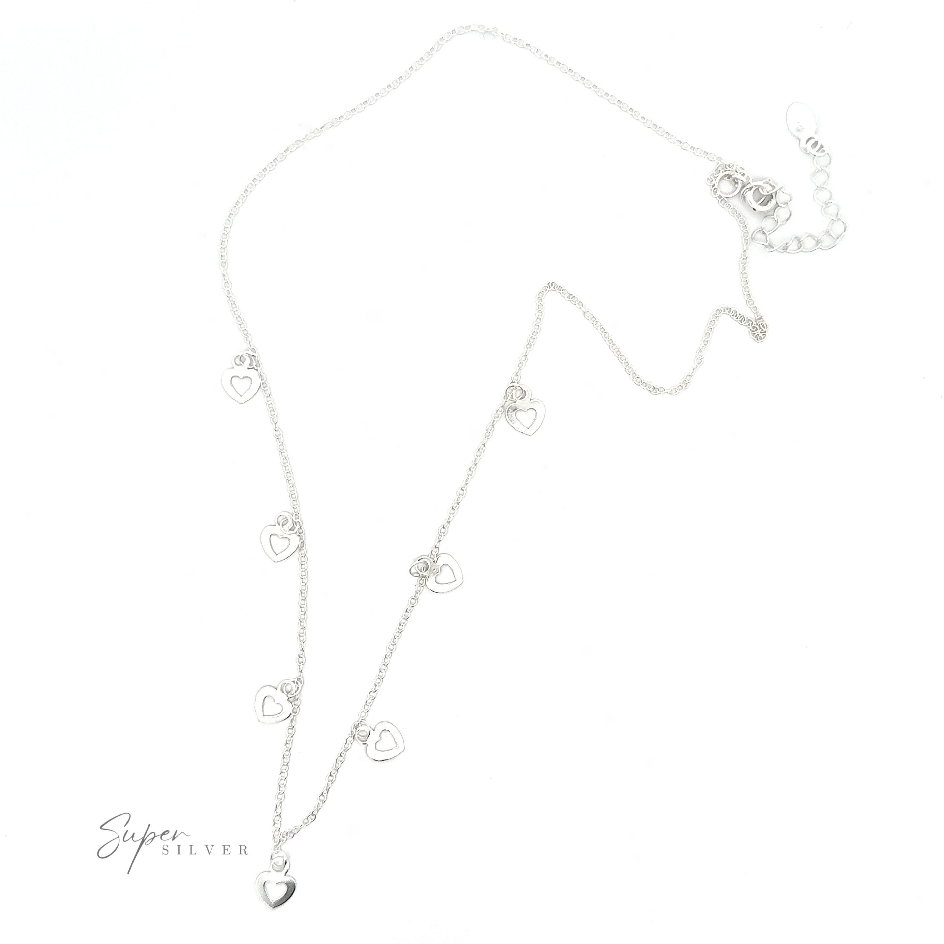 A Silver Open Heart Charm Necklace featuring heart-shaped pendants arranged at intervals along the chain and a small tag reading "Super Silver.