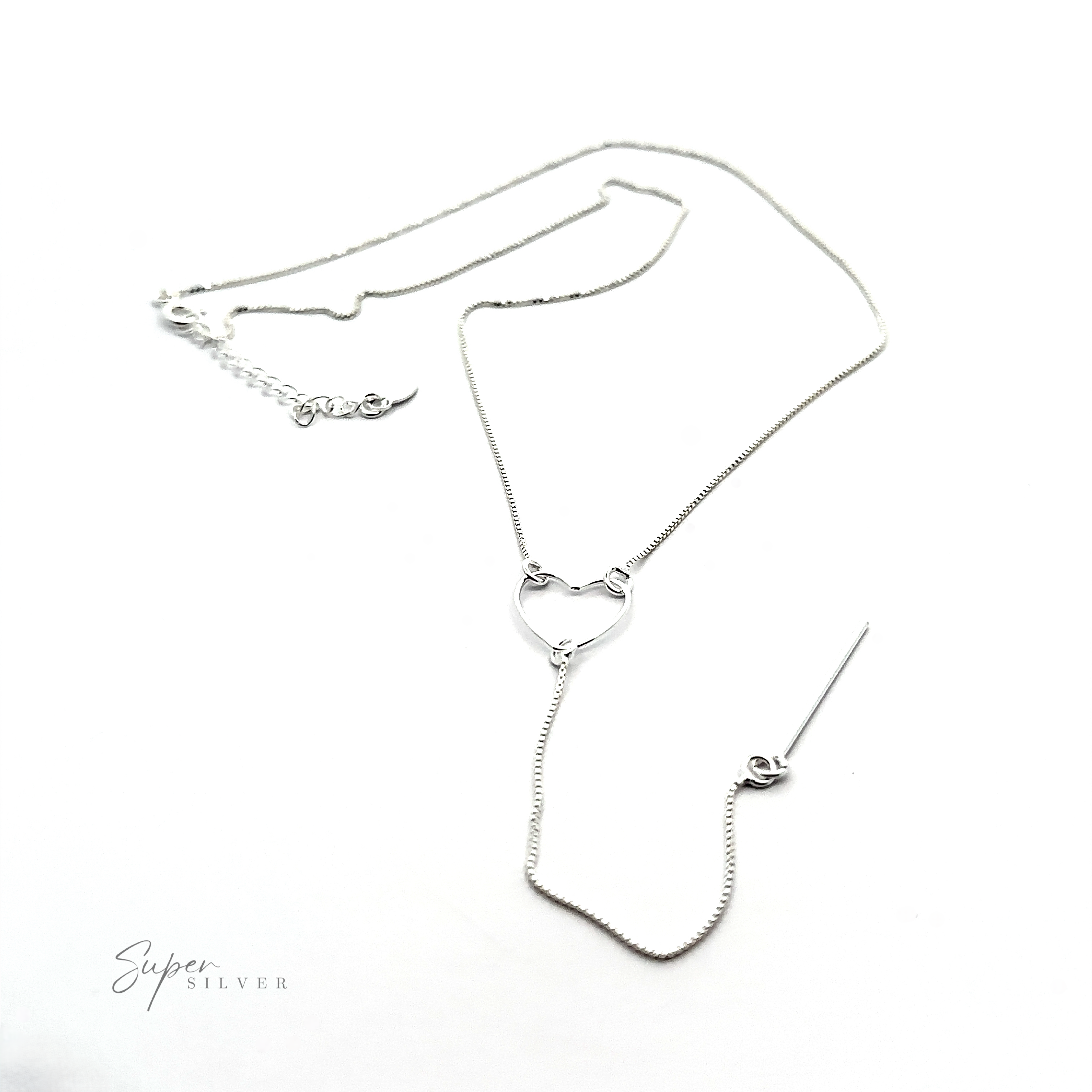 A sterling silver necklace with a small heart-shaped pendant and a slender chain, displayed against a white background. The chain also features an adjustable clasp. Text reads "Open Heart Lariat Necklace.
