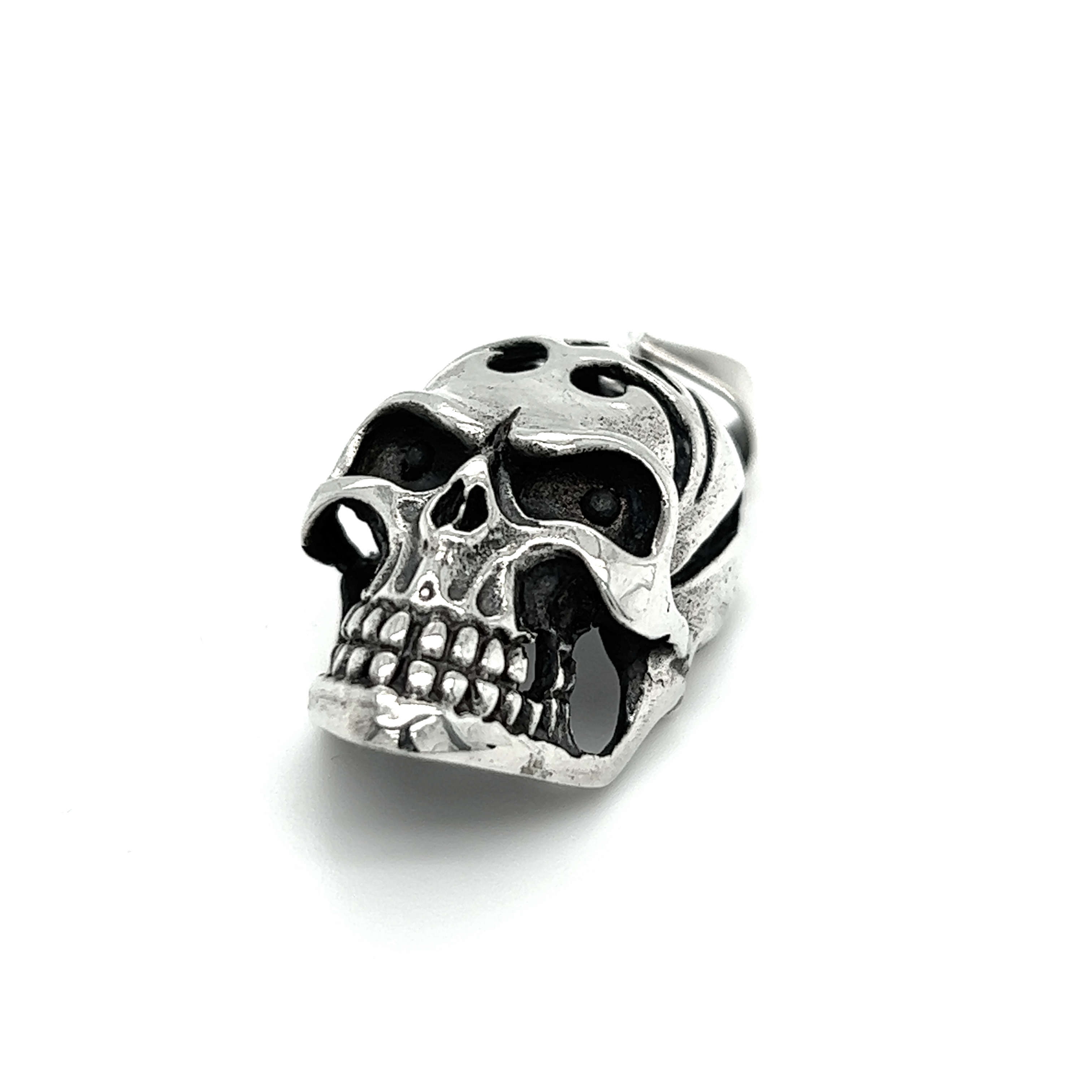 A distinctive Super Silver Skull Pendant with Swirl Design and an oxidized finish on a white background.