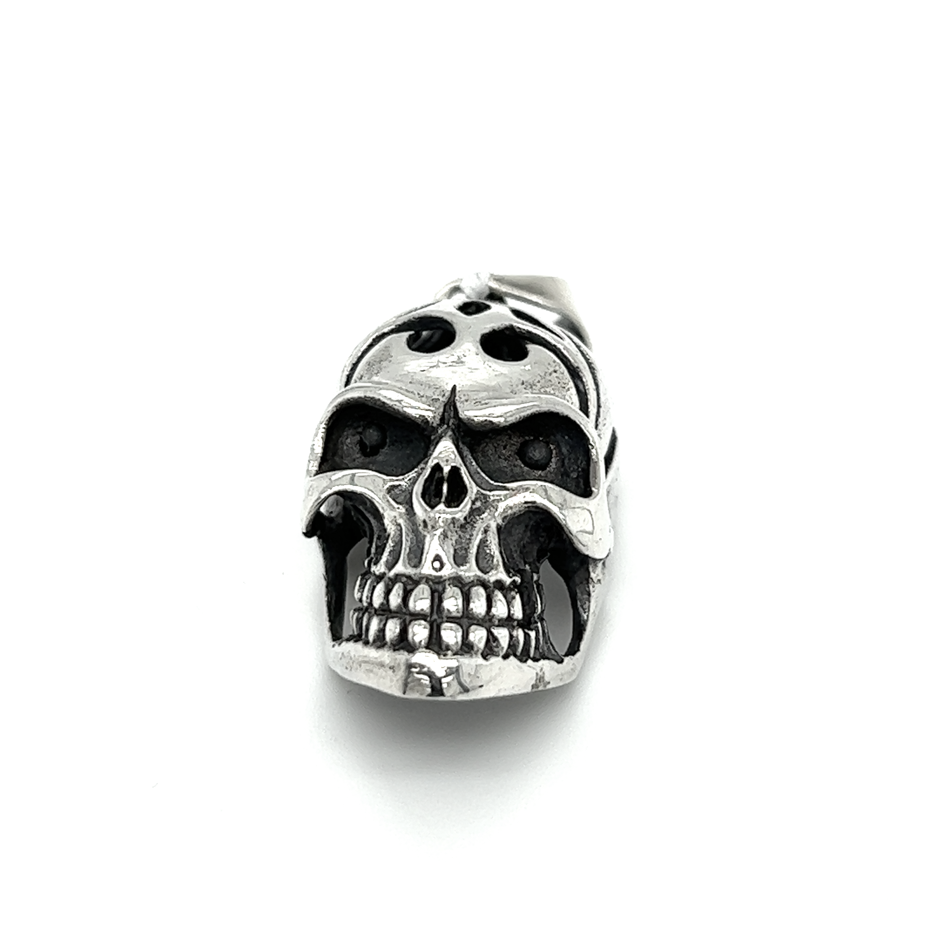 A distinctive Skull Pendant with Swirl Design from Super Silver, with an oxidized finish, displayed on a white background.