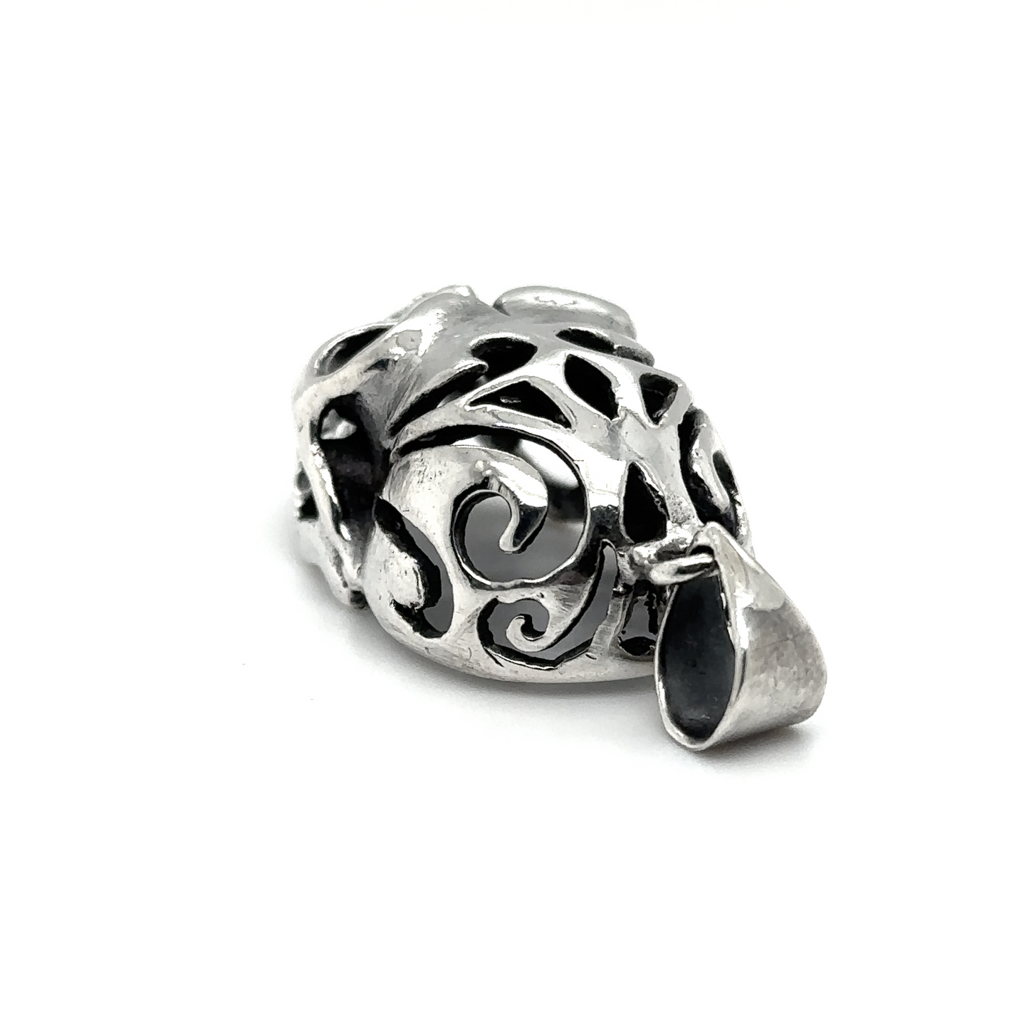
                  
                    A Super Silver Skull Pendant with Swirl Design and an oxidized finish.
                  
                