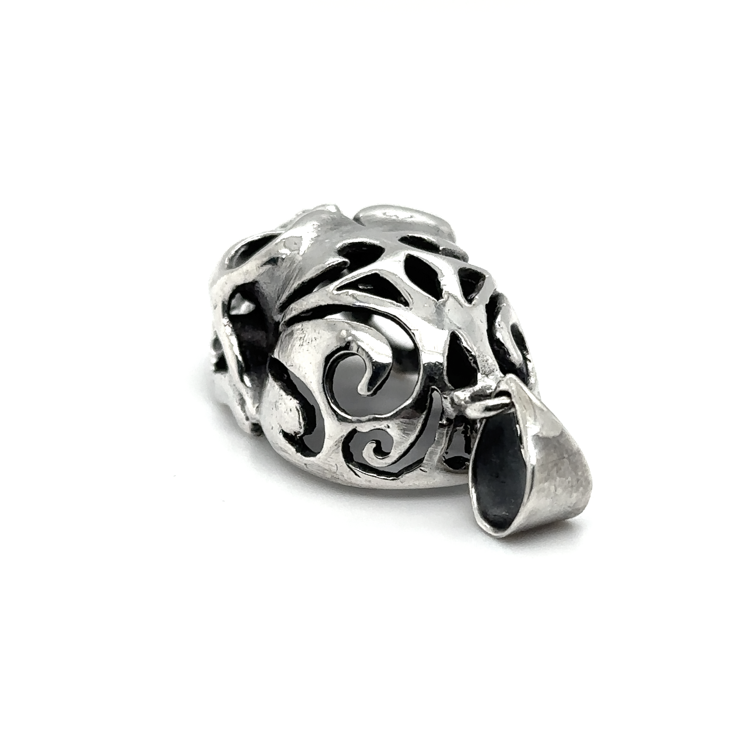 A Super Silver Skull Pendant with Swirl Design and an oxidized finish.