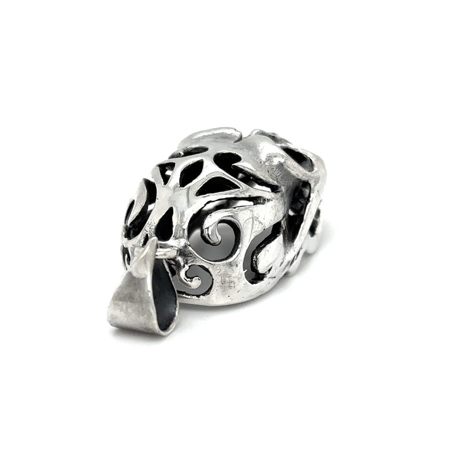 
                  
                    A Super Silver Skull Pendant with Swirl Design with a distinctive character and an ornate design.
                  
                