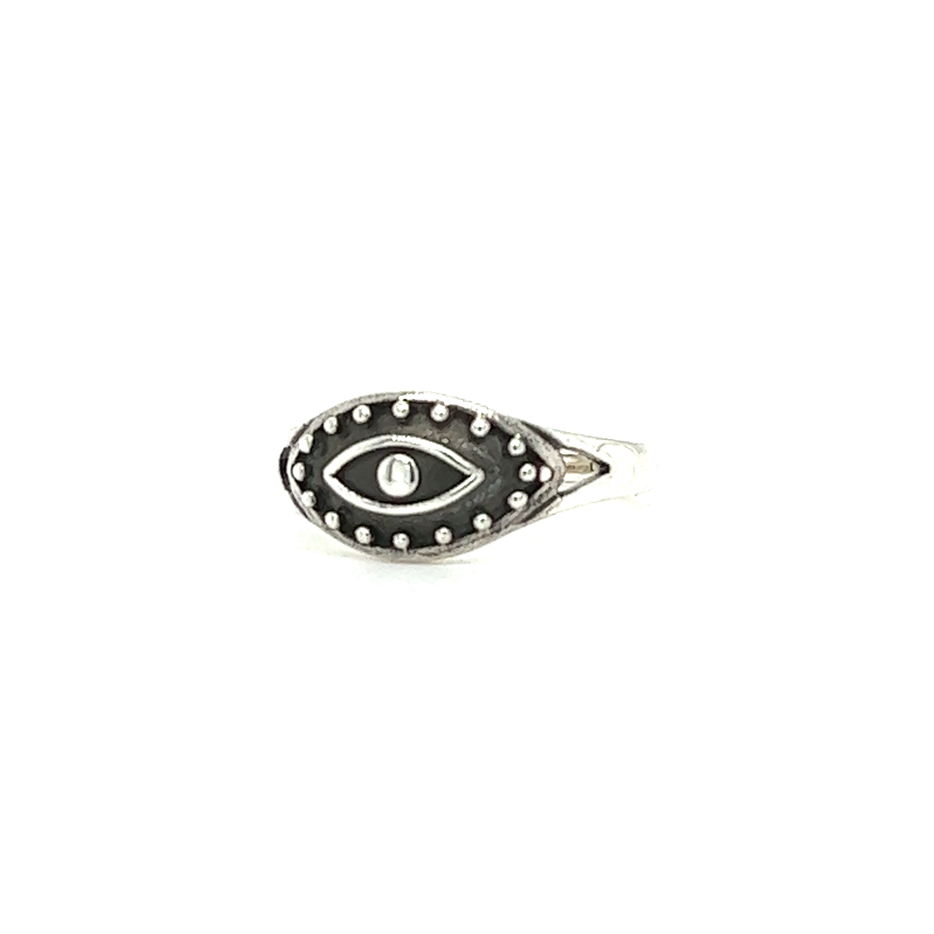 A modern Dotted Eye Ring with an evil eye on it.