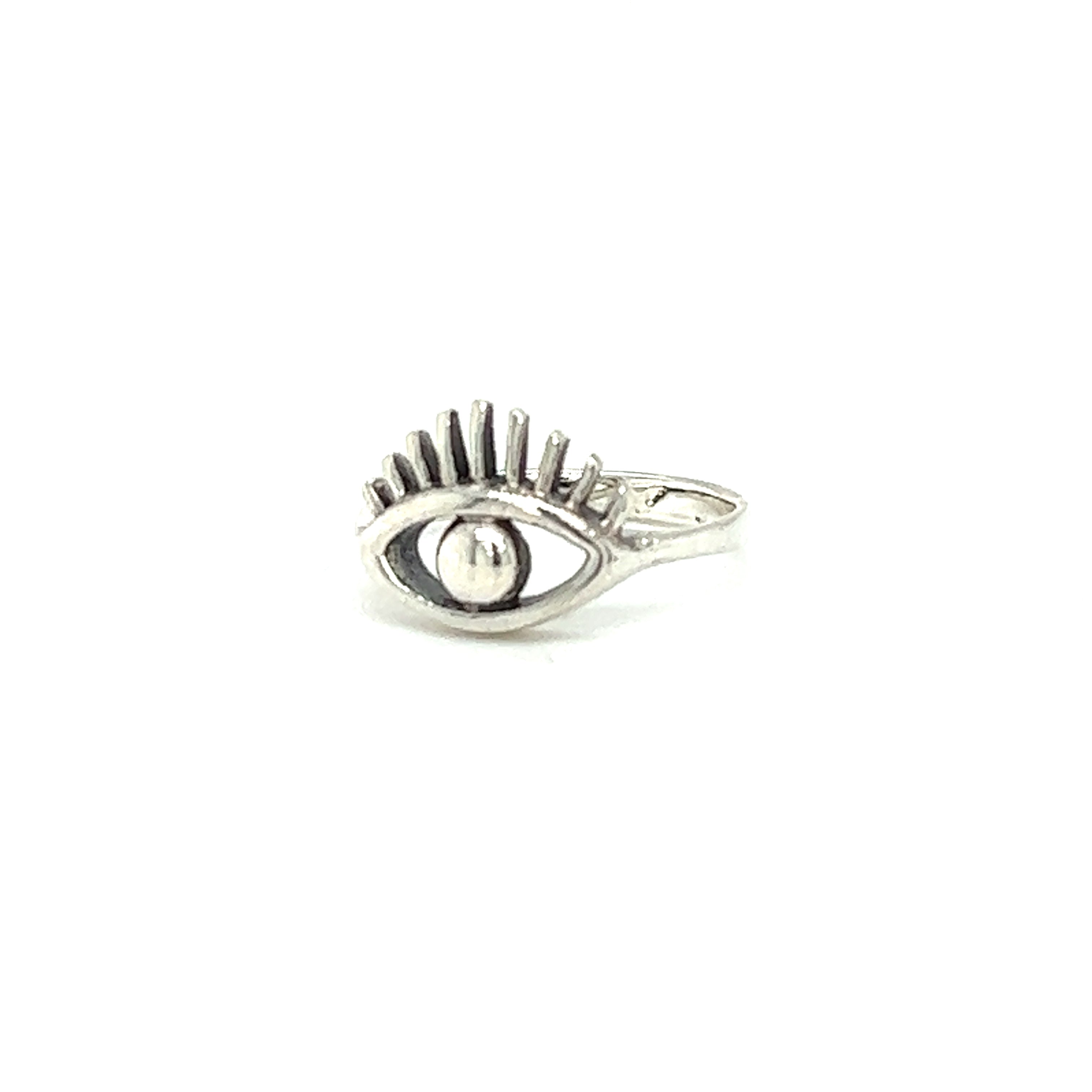 A minimalist silver ring with a Modern Evil Eye Ring.