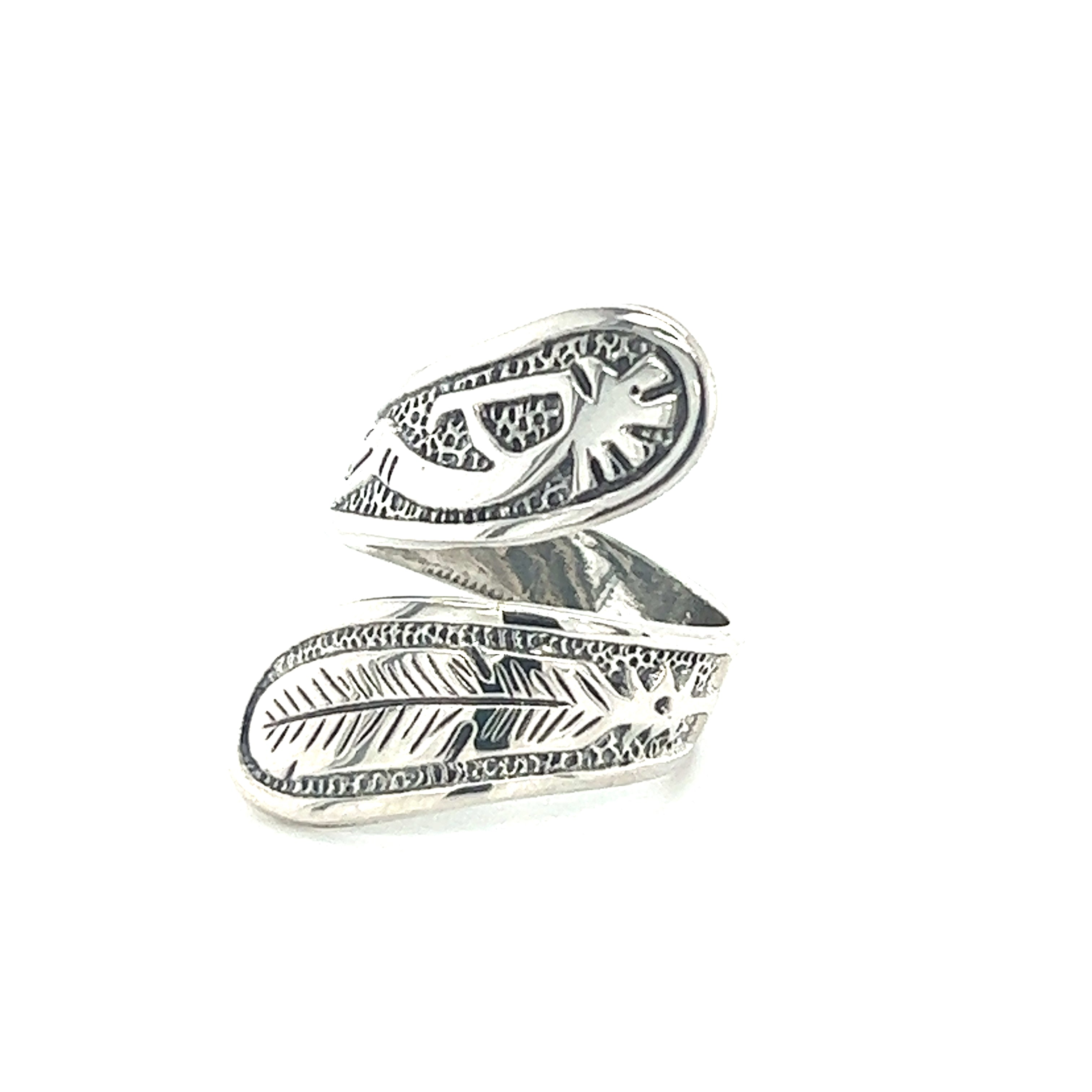An adjustable silver ring with a leaf design, inspired by the Kokopelli and Feather motifs, showcasing Southwest influence, named the Kokopelli and Feather Wrap Ring, by Super Silver.