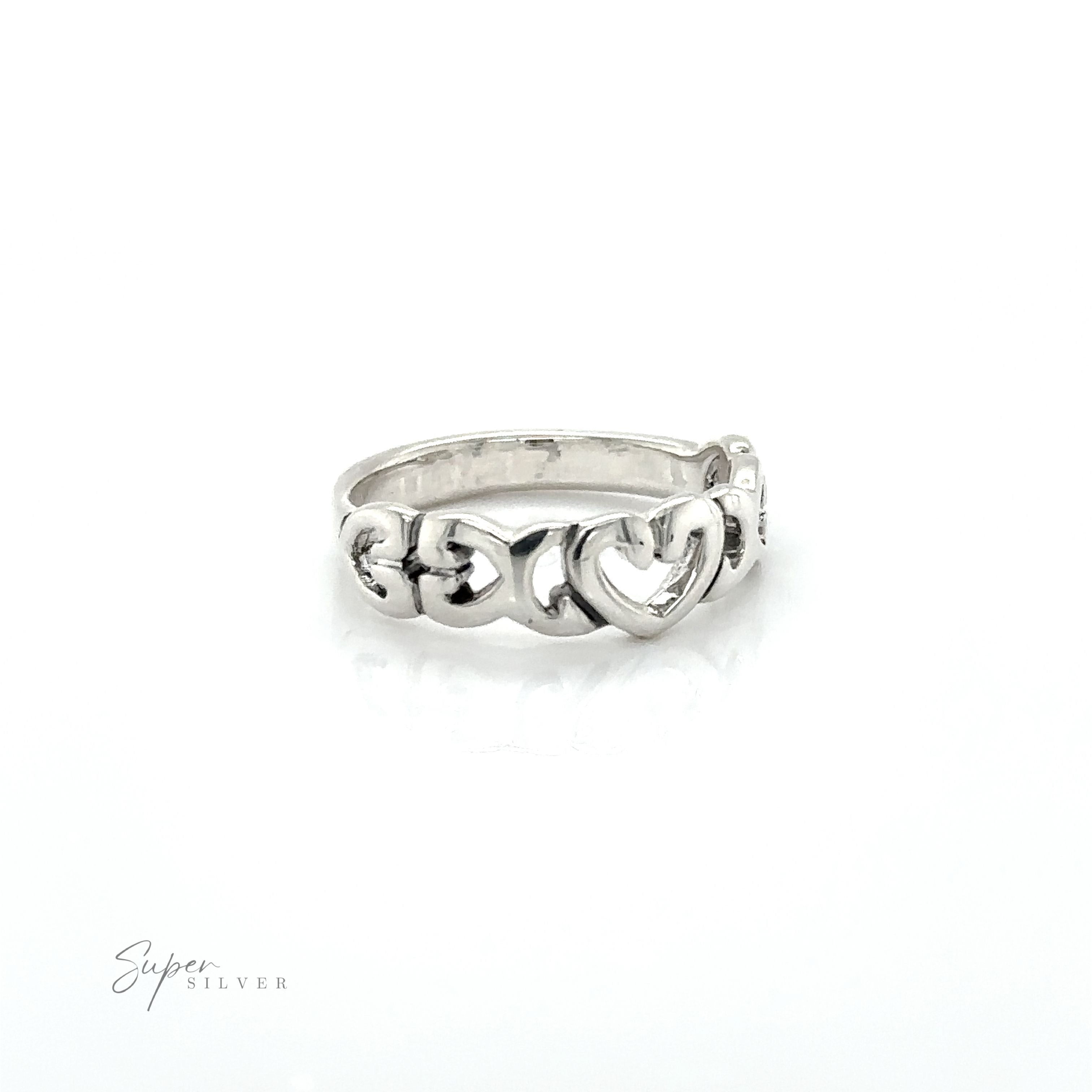 A sterling silver Open Heart Band Ring with a heart on it, symbolizing love.