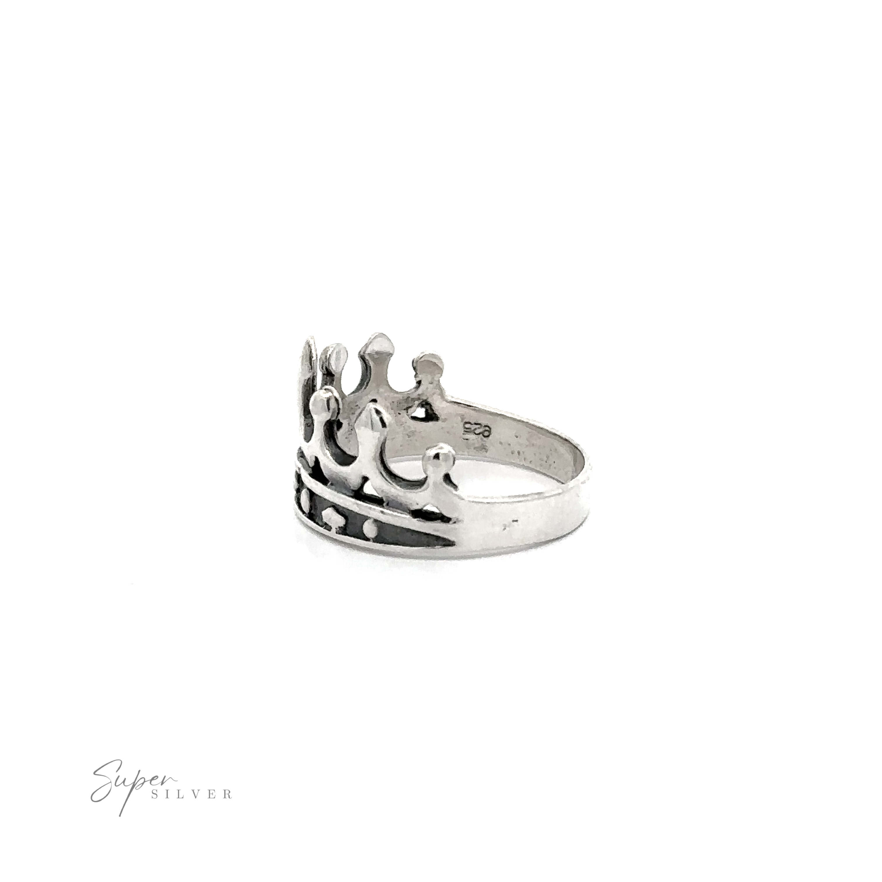 A graceful Crown Ring on a white background.