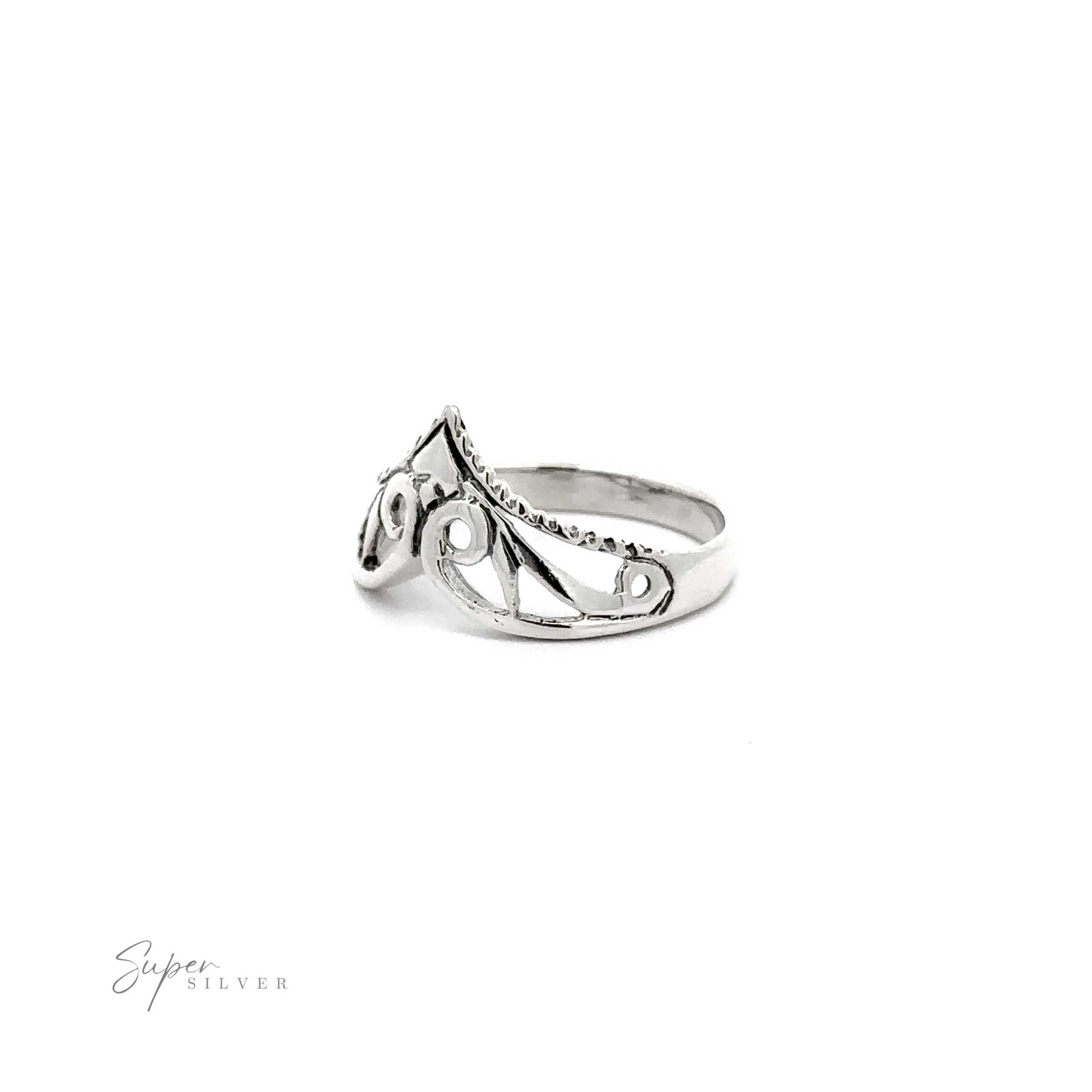 A vintage silver Chevron Tiara Ring with a filigree/spiral cutout design.