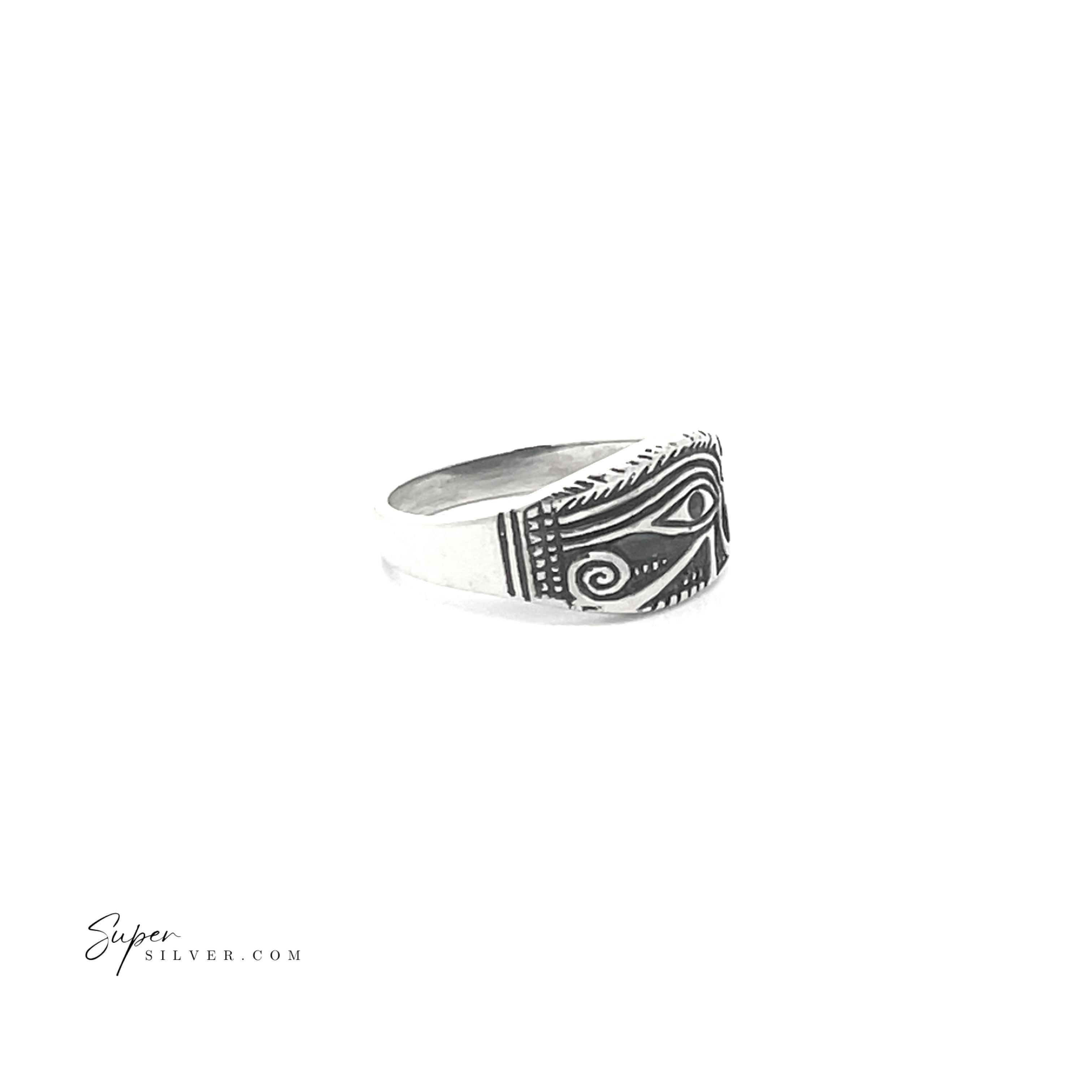 Eye of Ra Ring, a sterling silver piece with an oxidized finish, showcases engraved patterns and features an abstract Eye of Ra design.
