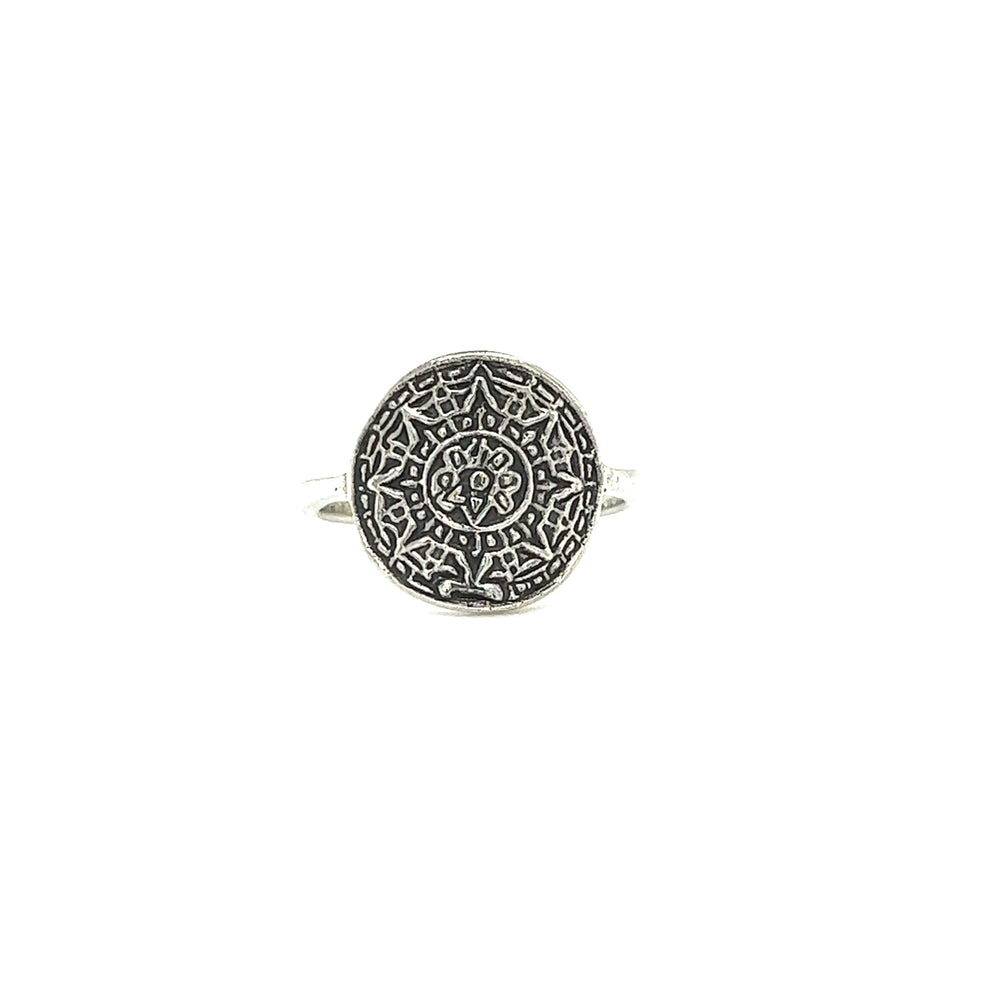 An ornate silver Aztec Sun Ring with a Sun God symbol, inspired by the Aztec civilization, from Super Silver.