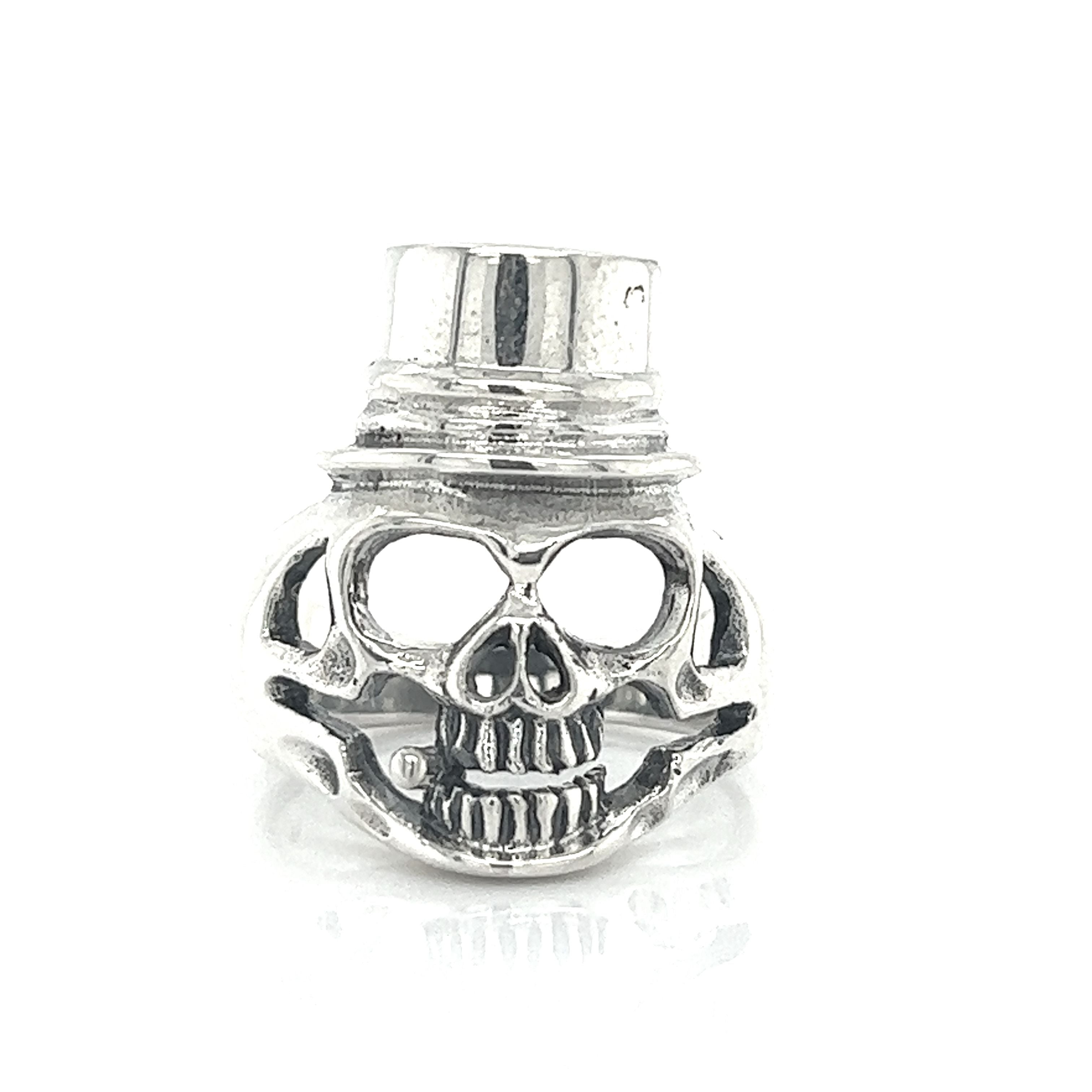 An edgy fashion statement featuring a Skull Ring with Top Hat on a white background.