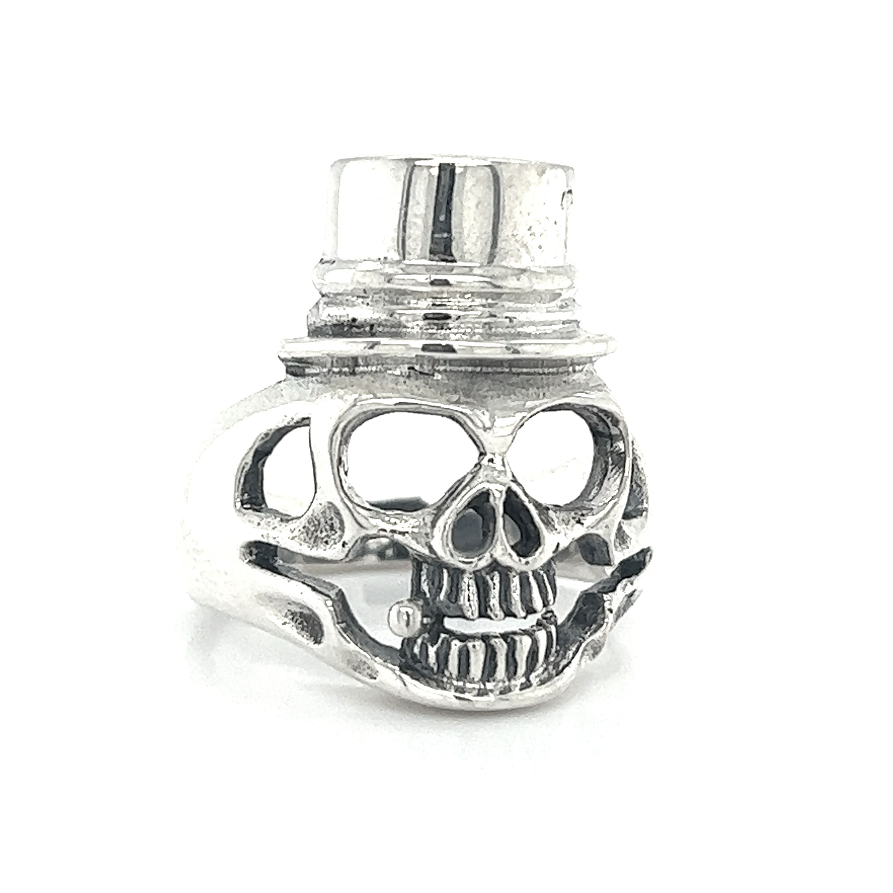 An edgy silver Skull Ring with Top Hat featuring a skull wearing a top hat.