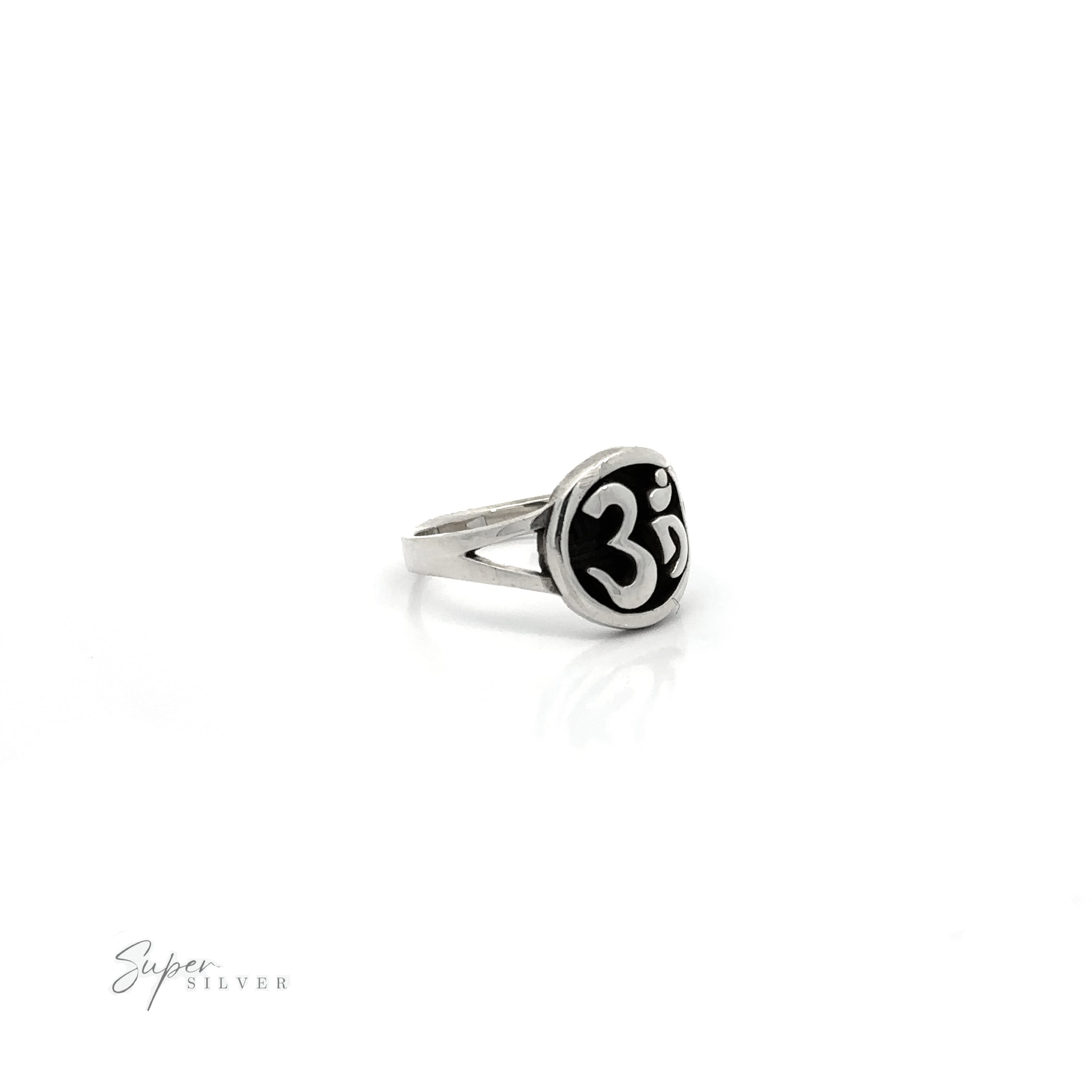 An oxidized silver ring with an Om Symbol Ring.