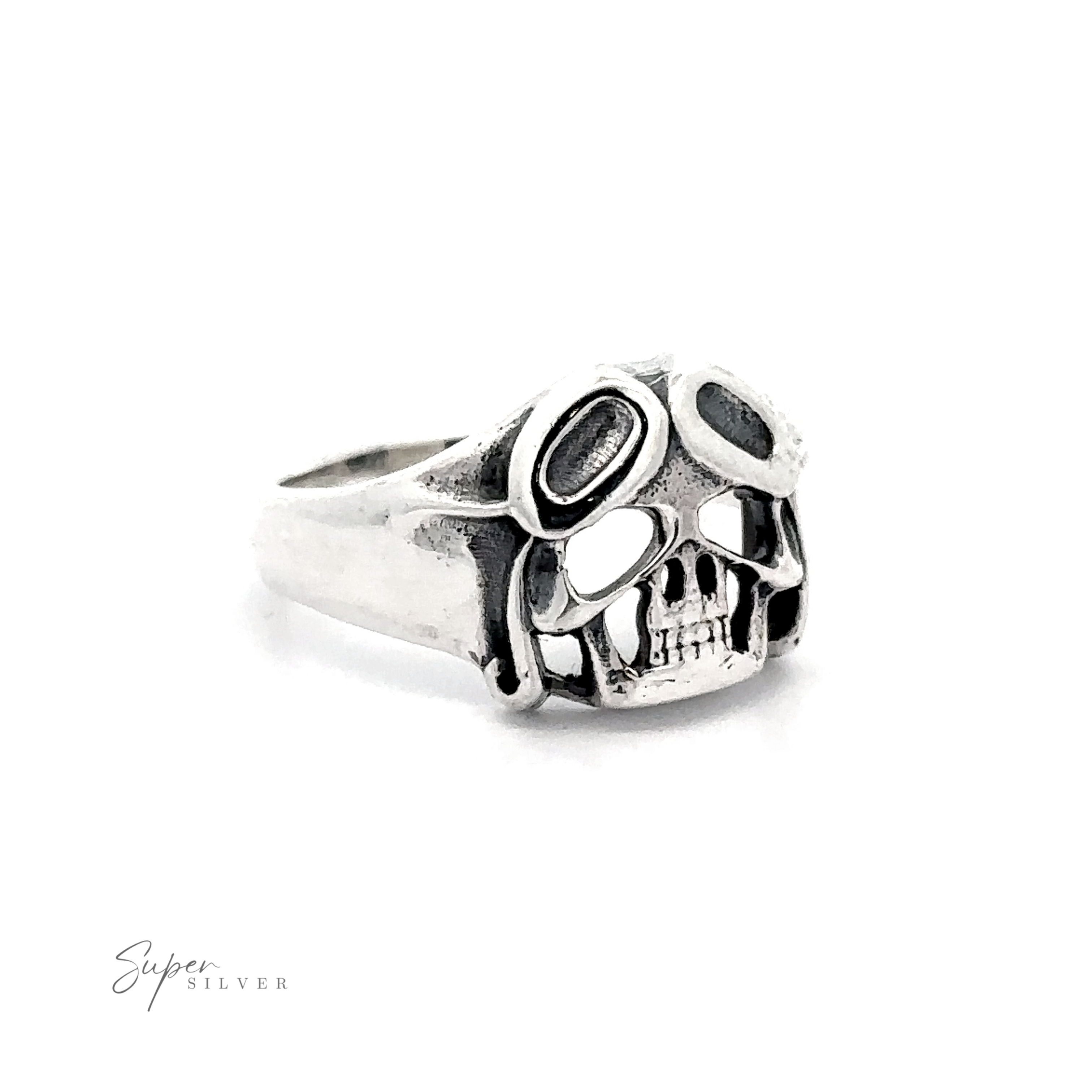 A Aviator Silver Skull Ring with black accents displayed against a white background.