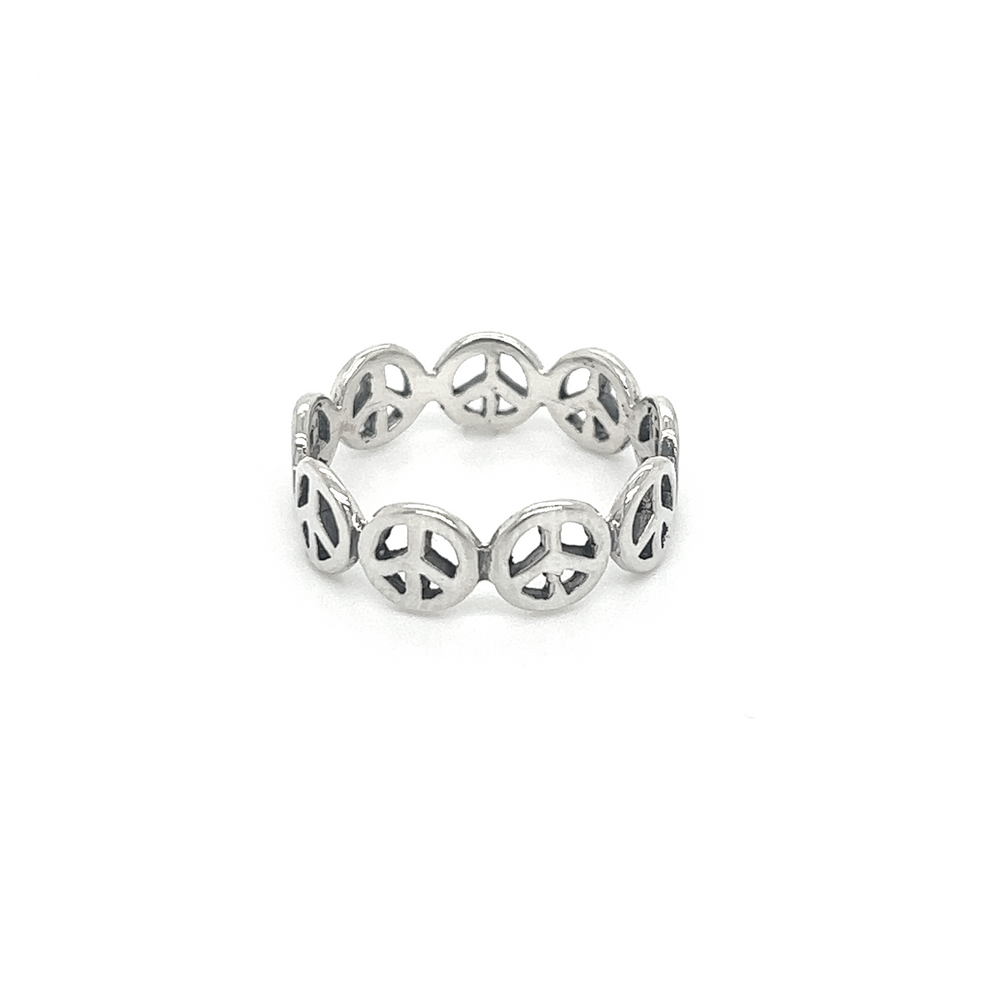 A Super Silver Peace Sign Band ring on a white background, symbolizing unity.