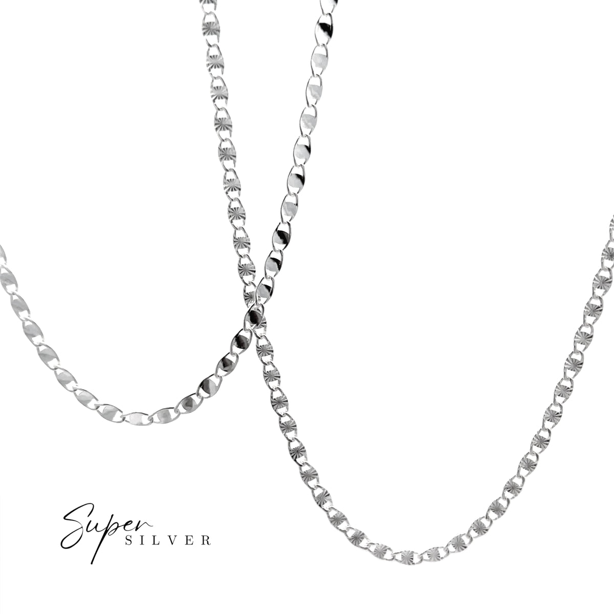 Close-up of a shiny silver chain necklace with a classic figaro link design on a white background; “Super Silver” is written in the bottom left corner. This elegant Sterling Silver Italian Valentina/Valentino Chain is made in Italy, offering both quality and timeless style.