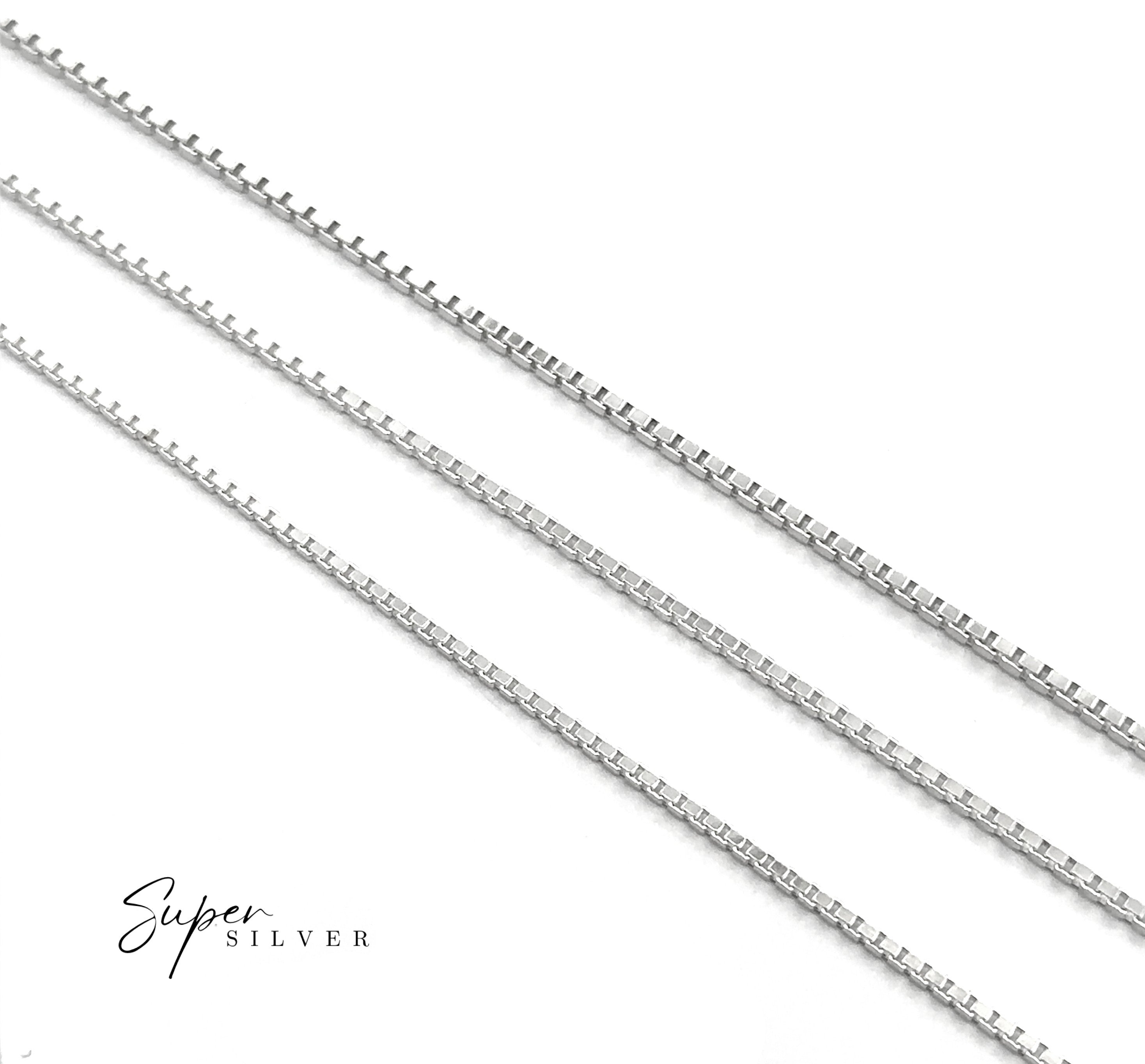 Three Italian Edge Box Chains in sterling silver are arranged parallel on a white background, featuring the "Super Silver" logo in the lower left—ideal for a minimalist men's necklace look.