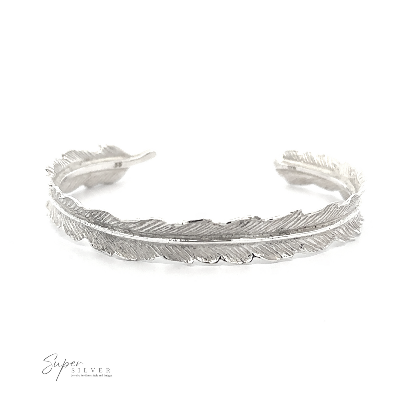 A Detailed Feather Cuff shaped like a feather, positioned with open ends facing forward. The bracelet has detailed feather patterns and textures, giving it a vintage feel. A small "Super Silver" logo is present in the bottom left corner.