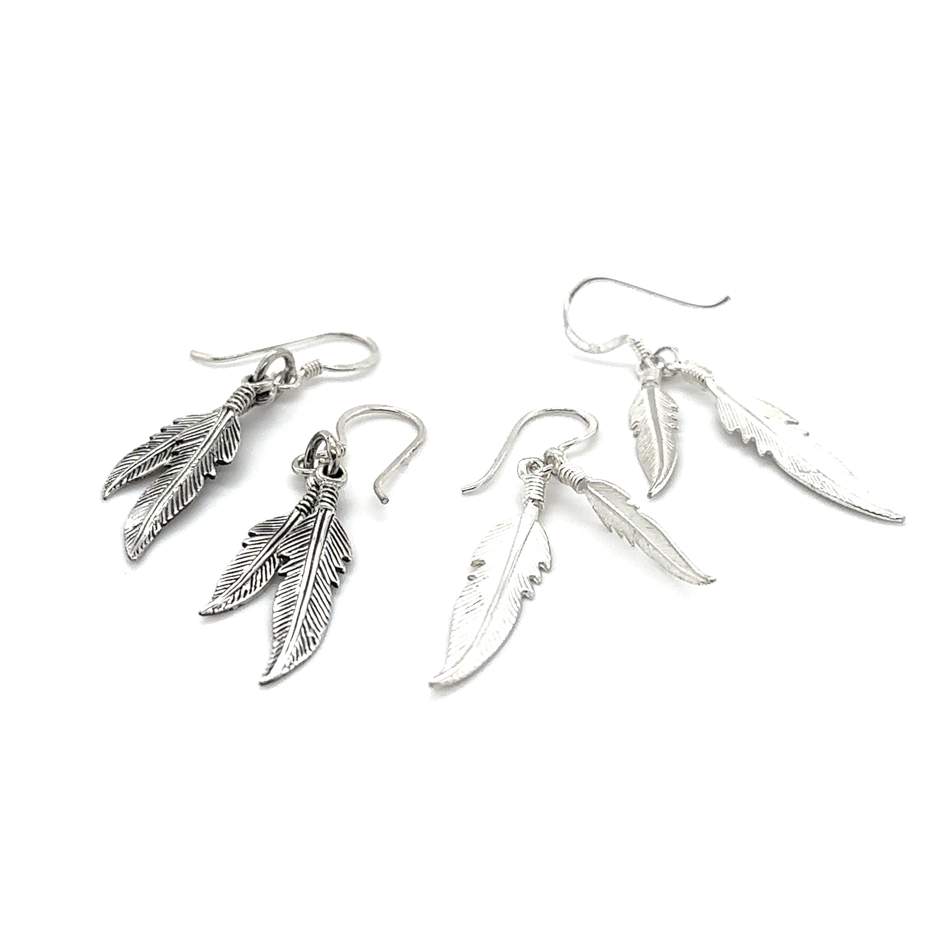 Three Super Silver Double Feather Earrings on a white background.