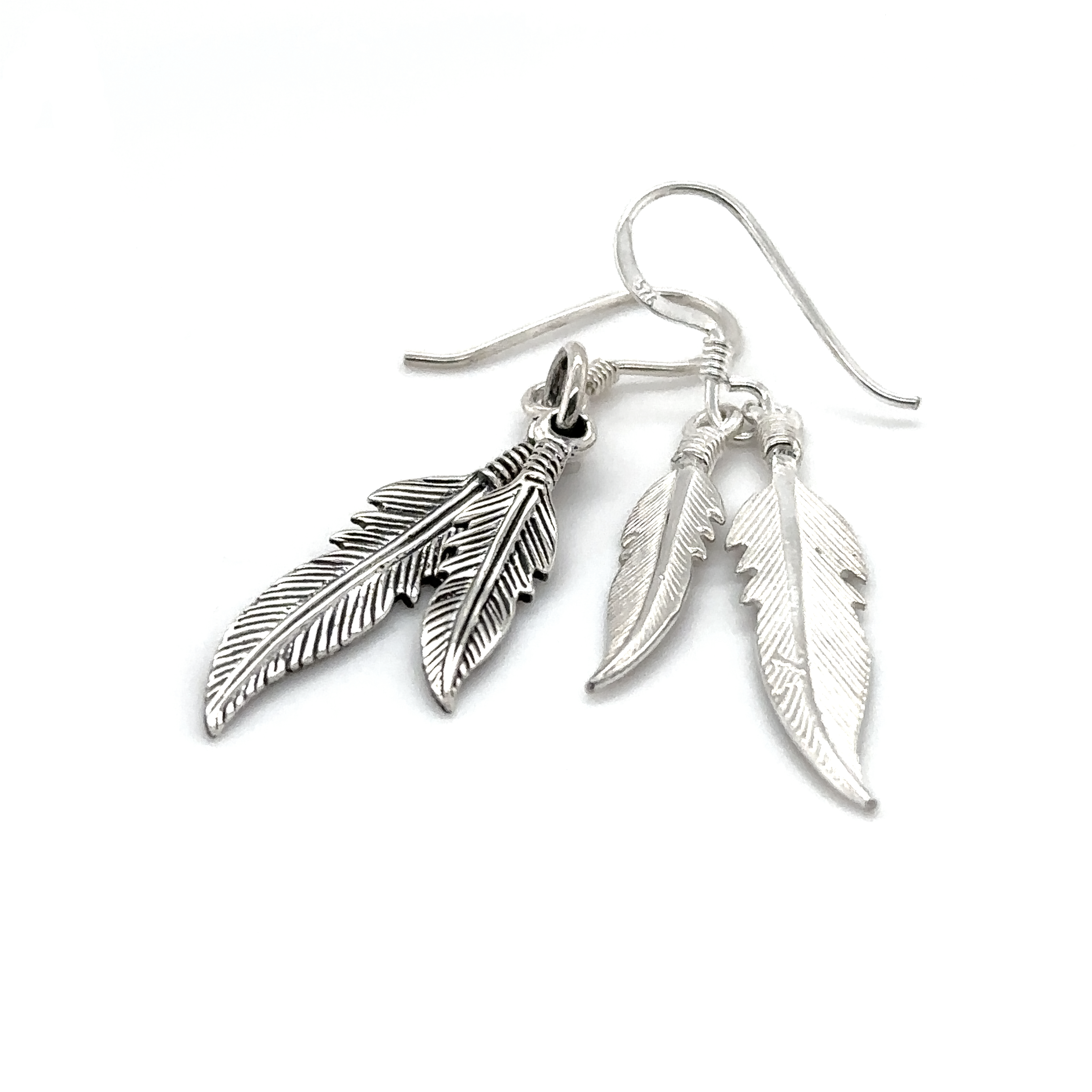 A pair of Super Silver Double Feather Earrings on a white background featuring French hook.