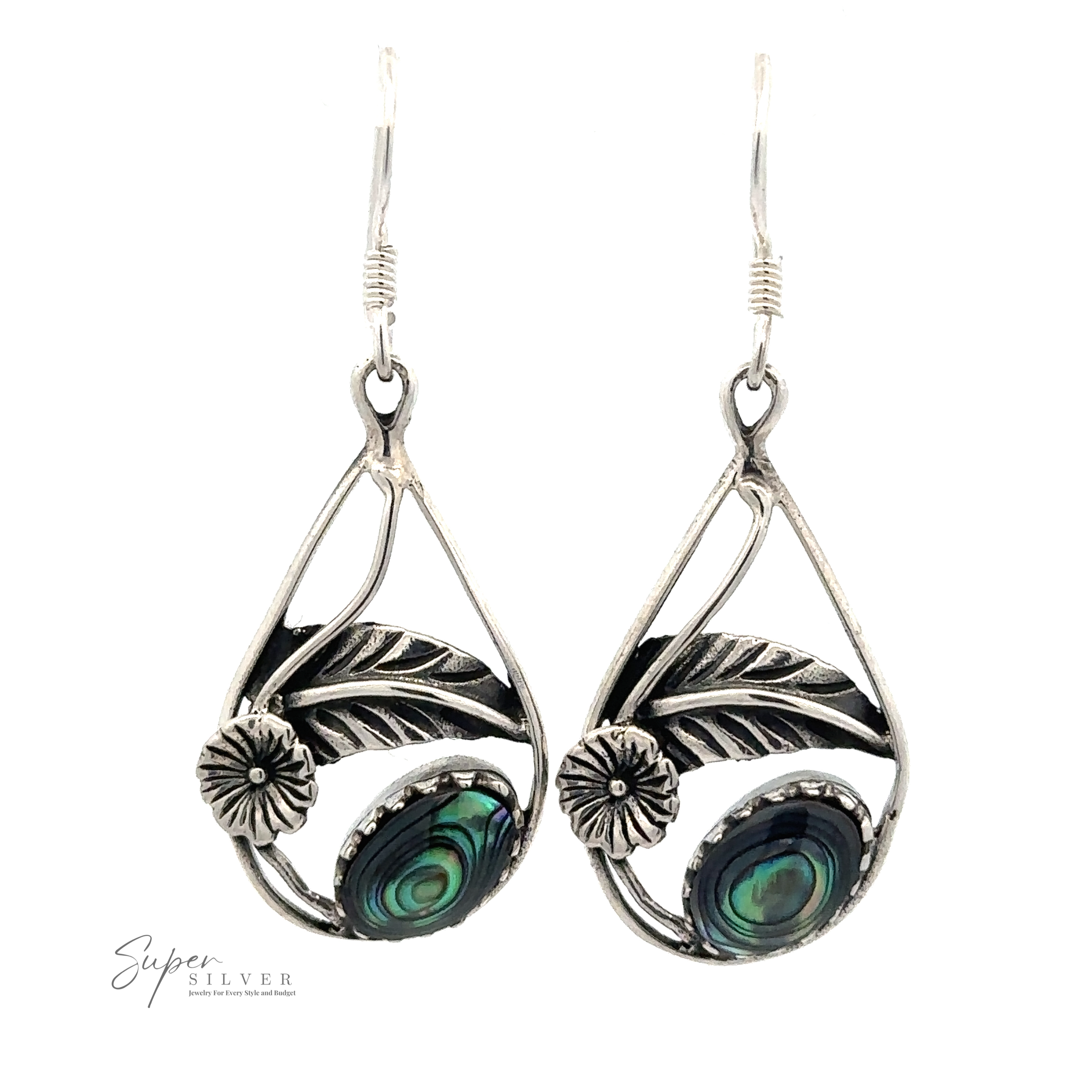 Pair of sterling silver Inlaid Teardrop Earrings With Floral Setting featuring leaf and floral designs with abalone shell accents.