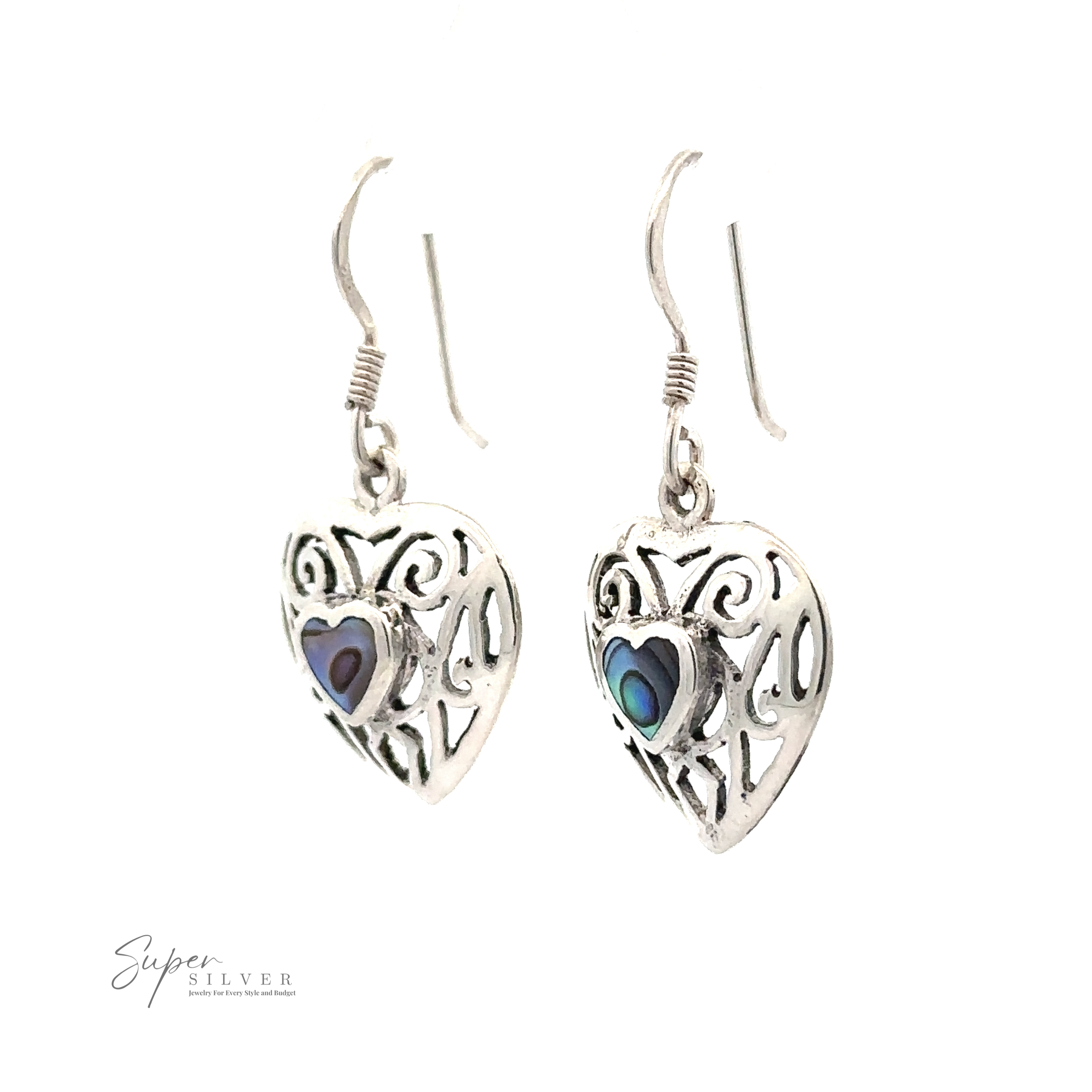 A pair of Elegant Heart Shaped Abalone Earrings with intricate designs and small colorful accents in the center. "Super Silver" logo in the bottom left corner.