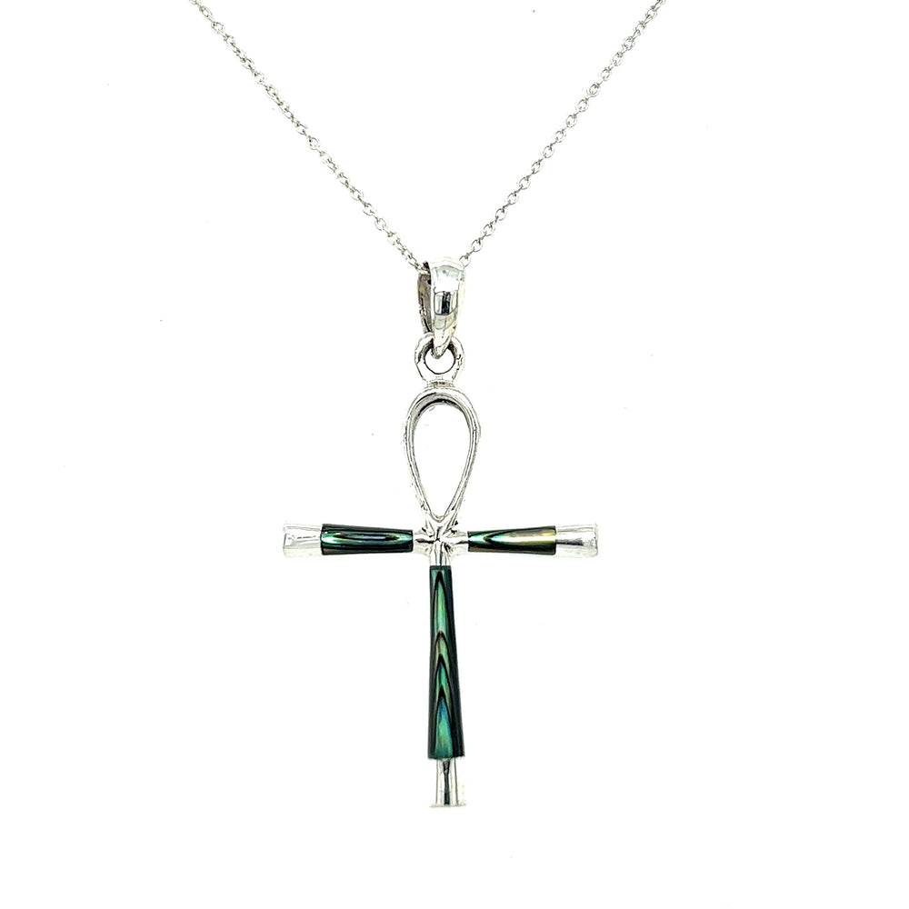 
                  
                    This statement piece features a Super Silver Inlay Stone Ankh Pendant adorned with green and black stones, all elegantly displayed on a silver chain. Inspired by ancient Egypt, this Inlay Stone Ankh Pendant is a perfect accessory to
                  
                