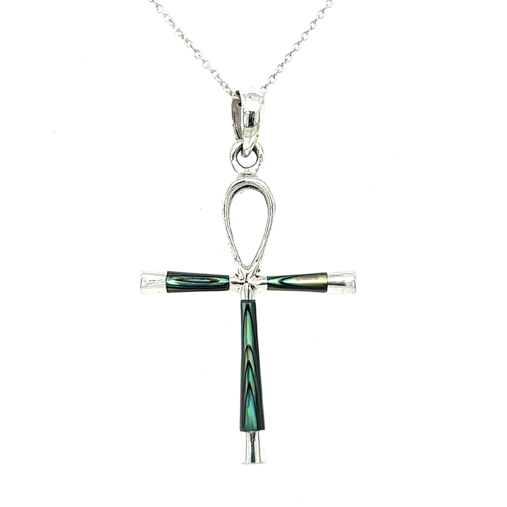 
                  
                    This statement piece features an Inlay Stone Ankh Pendant adorned with black and green stones, elegantly displayed on a Super Silver chain.
                  
                