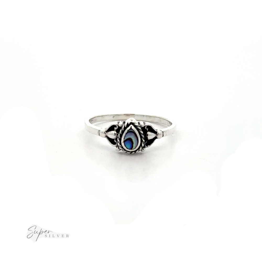 
                  
                    A Delicate Teardrop Inlay Stone Ring with Vintage Look with a turquoise stone.
                  
                