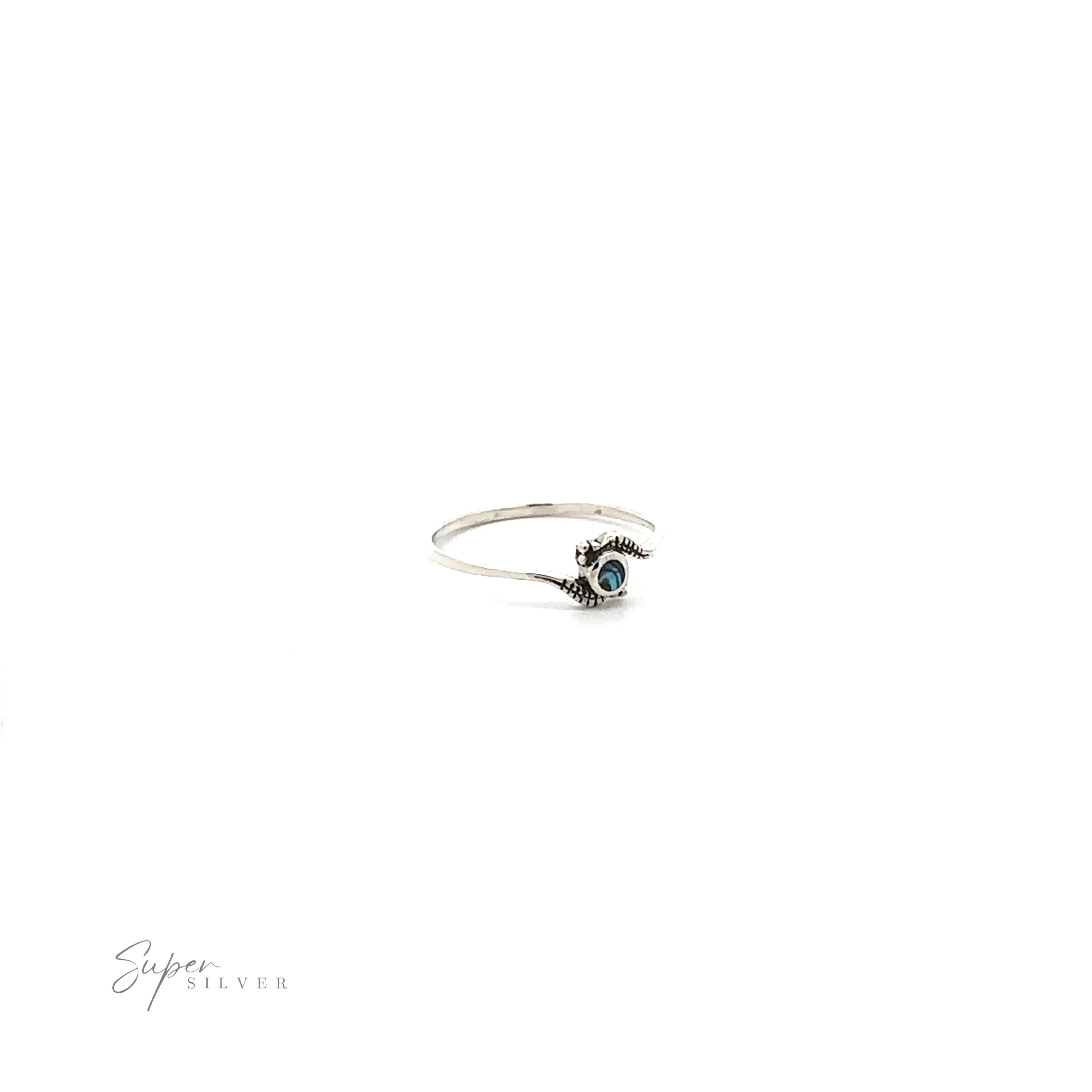 Tiny Freeform Ring with a Round Turquoise Stone on a white background.