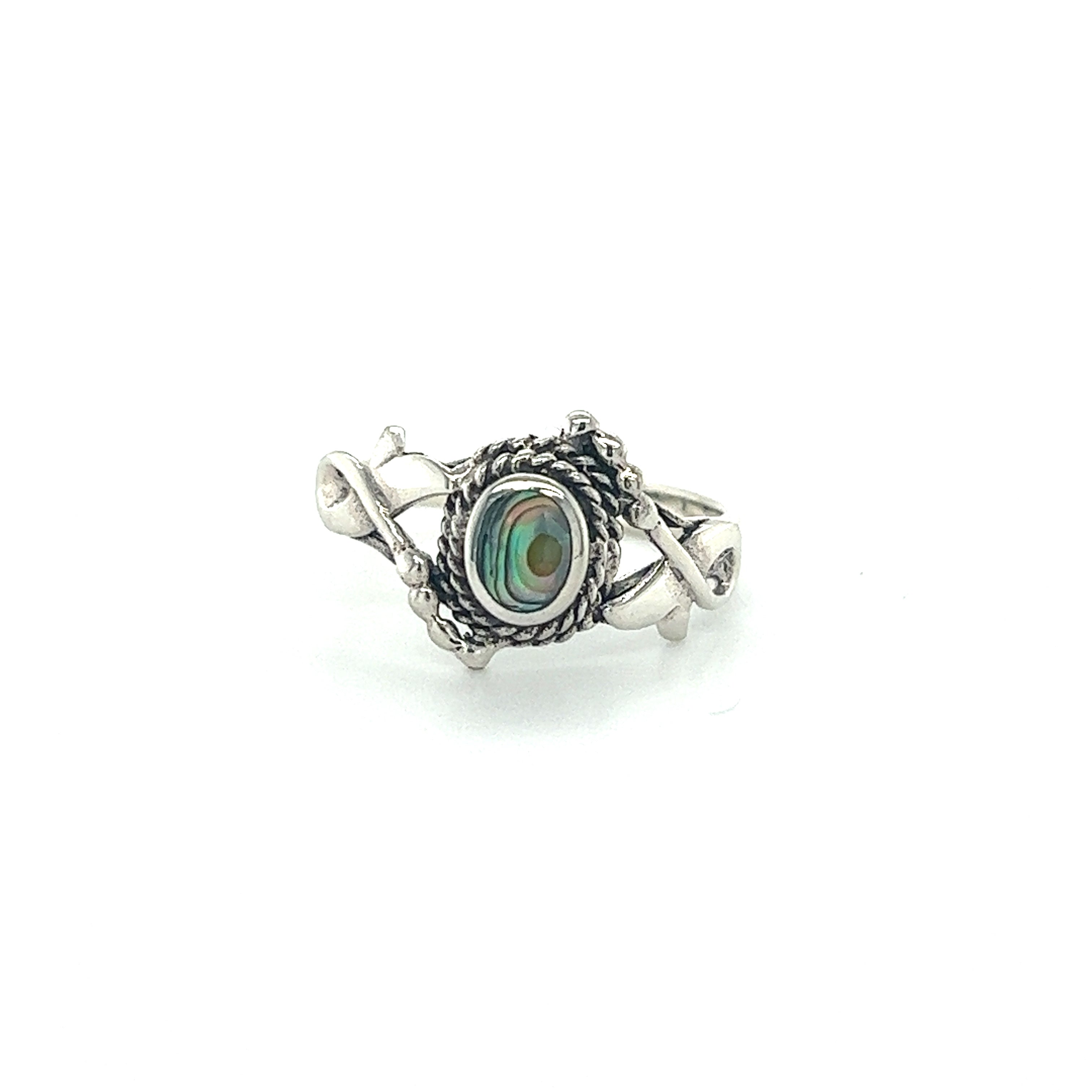 A silver ring with an inlaid green stone, exuding a Super Silver Bali boho vibe.