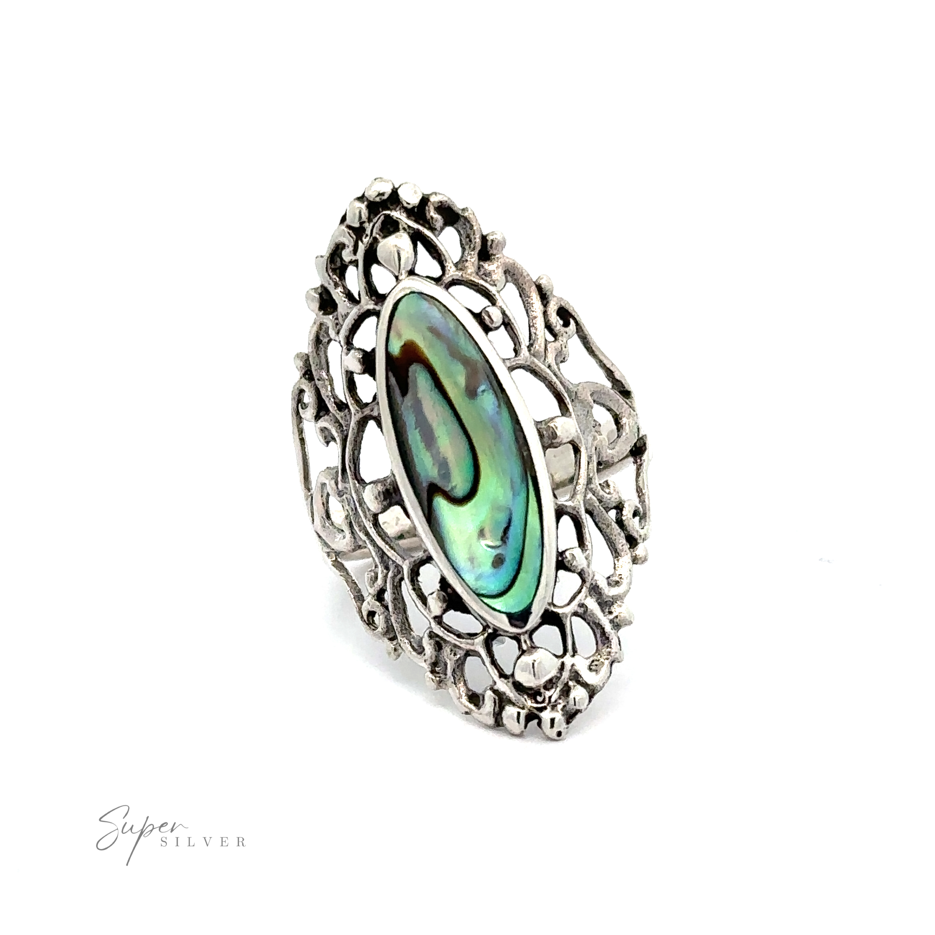 An ornate silver Filigree Shield Ring with inlaid stones, with an oval abalone shell and delicate filigree pattern.