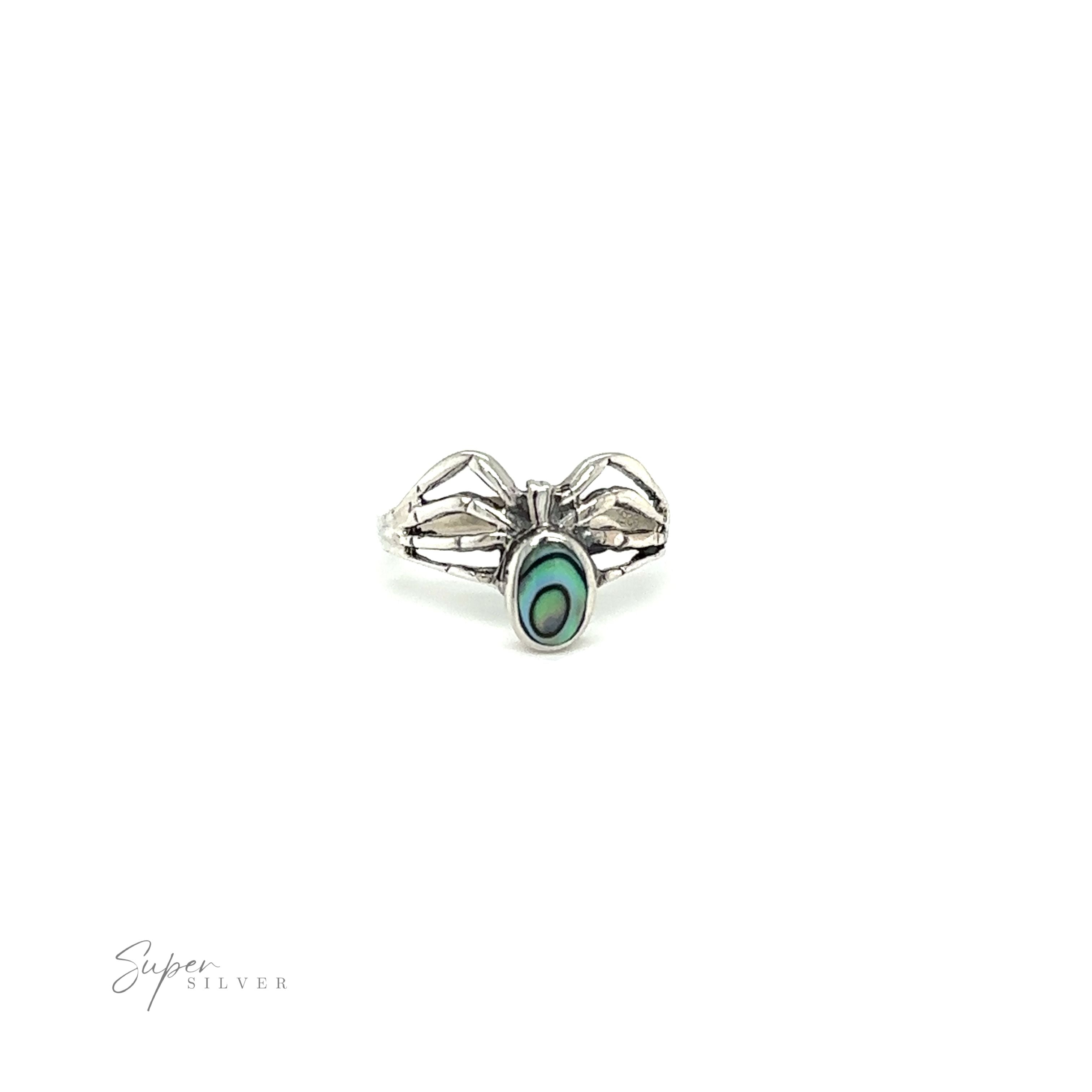 A mystical Inlay Stone Spider Ring by Super Silver, adorned with a spider design.