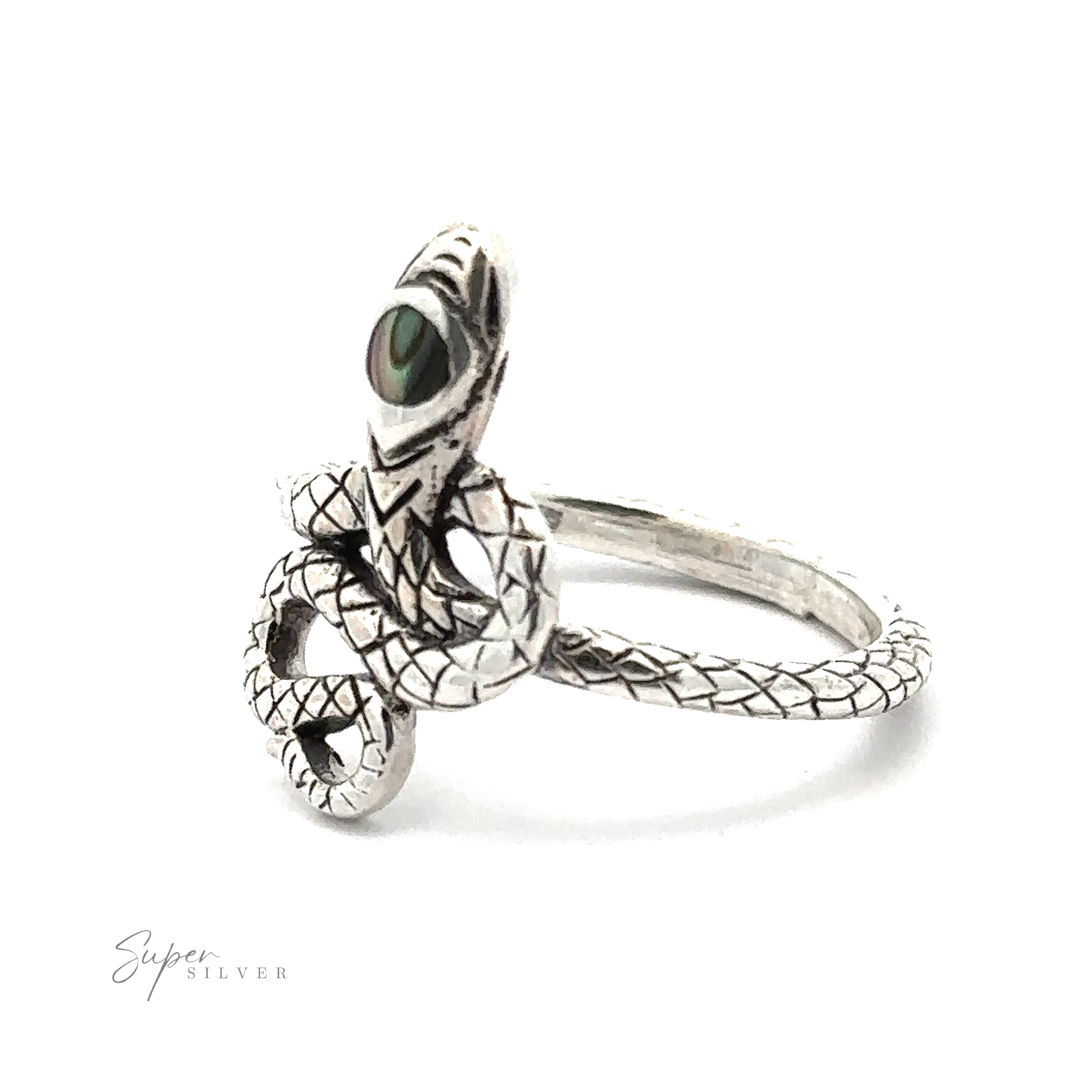 The Coiled Snake Ring with Inlaid Stone is a sterling silver piece designed to resemble a serpent coiled around the band. It features detailed scales and a green gemstone set as the snake's eye, embodying the essence of transformation jewelry.