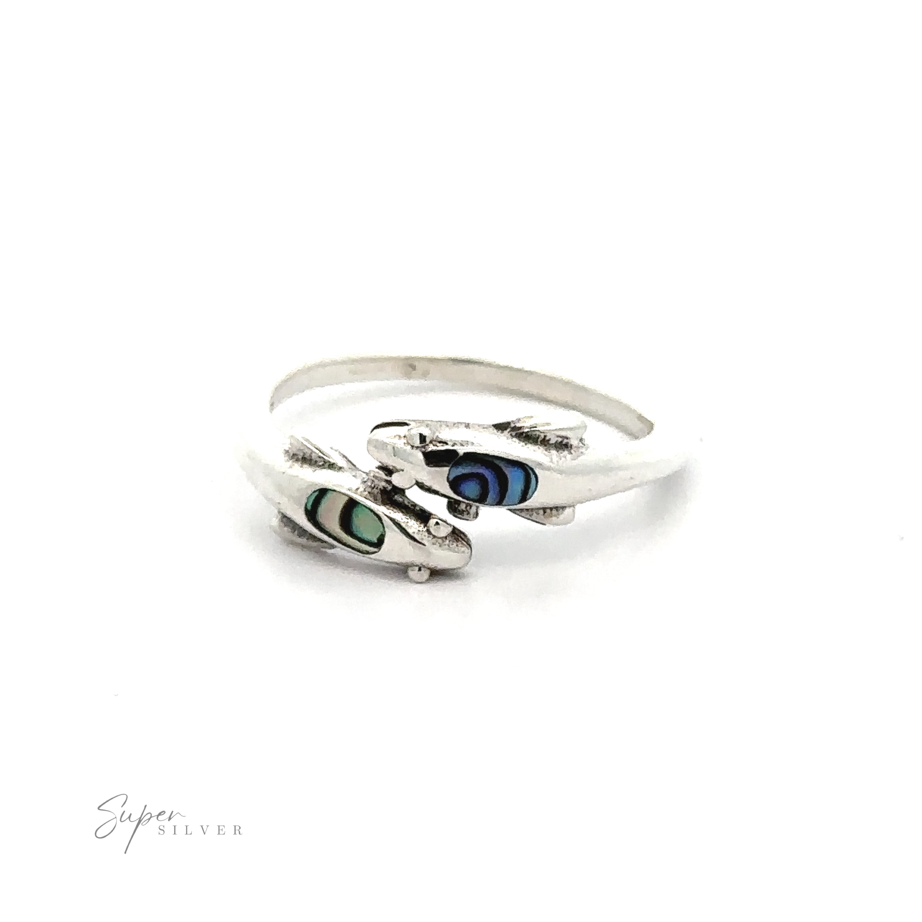 Sentence with replaced product name: Dainty Inlaid Dolphin Ring featuring a swirling design with embedded blue and green eye-shaped accents, placed on a white background.