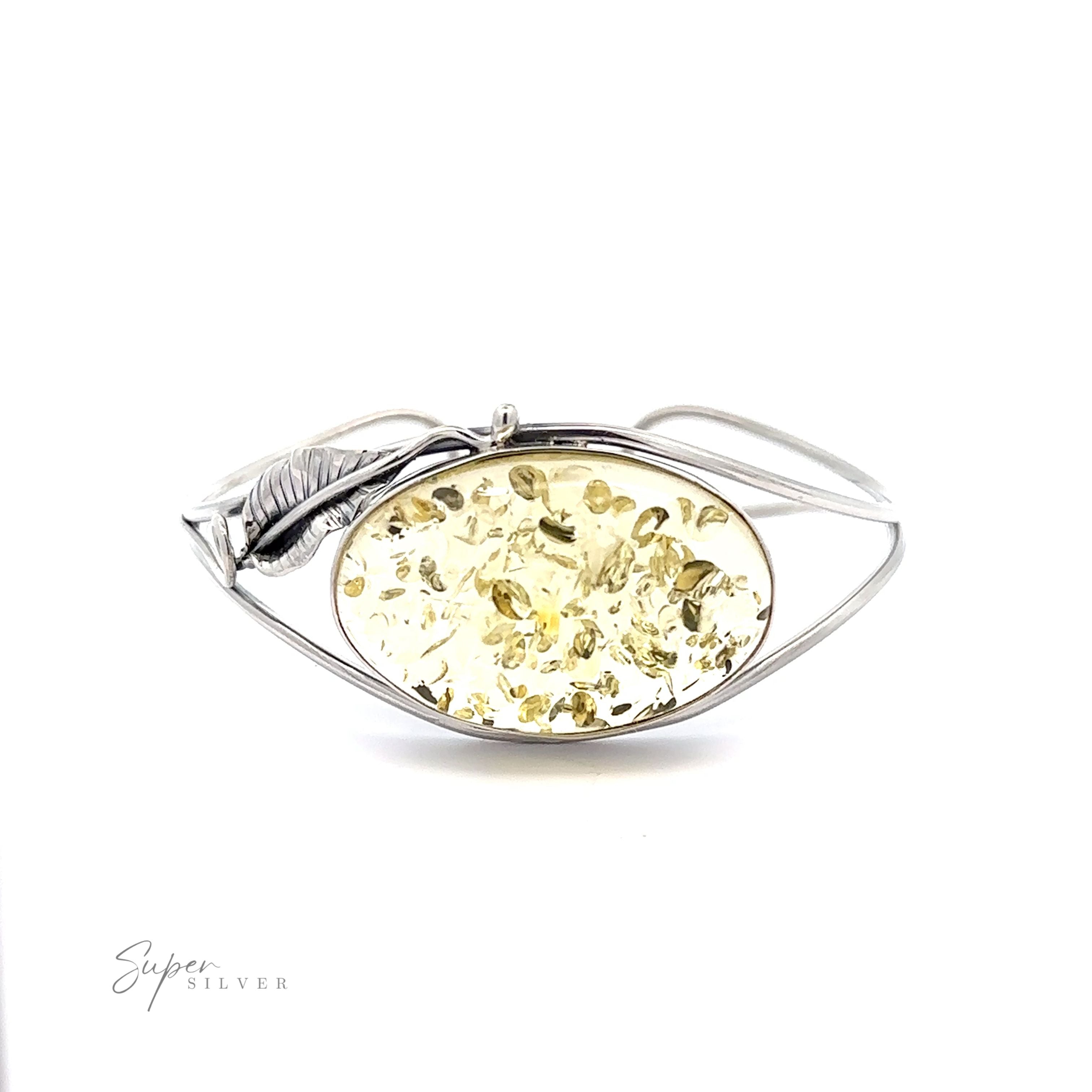 A statement silver ring adorned with a vibrant Delicate Floral Amber Cuff.