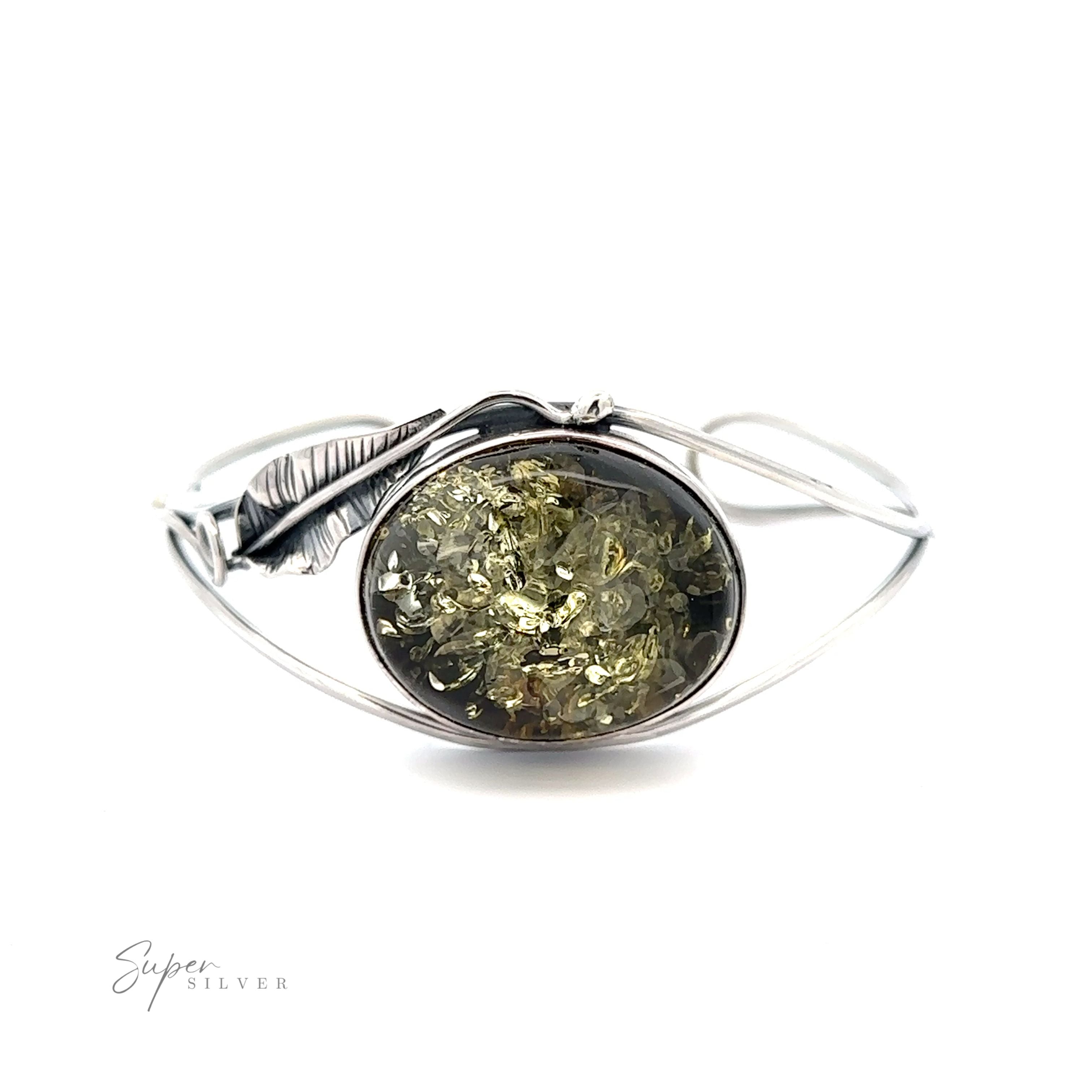 A statement Delicate Floral Amber Cuff bracelet with a green stone.