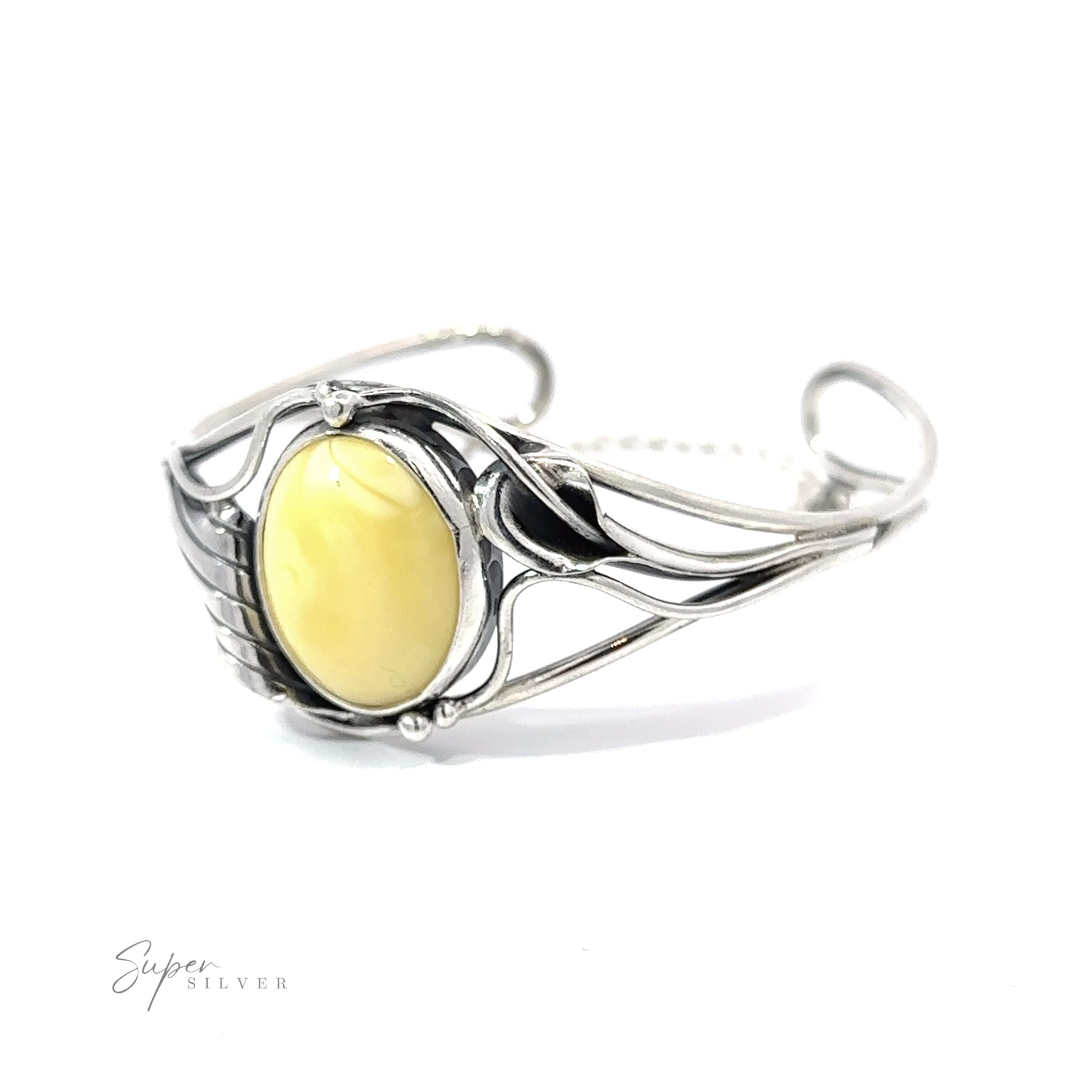 A vintage charm Butterscotch Amber Bracelet with Nature Detailing showcasing a fossilized tree sap.