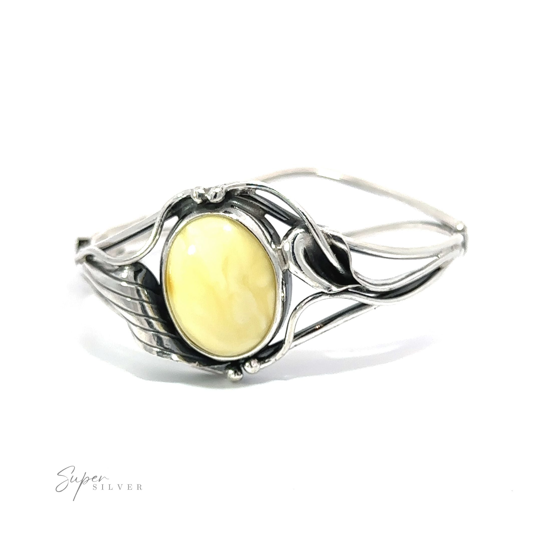 A Butterscotch Amber Bracelet with Nature Detailing showcasing a fossilized tree sap stone in a warm yellow hue.