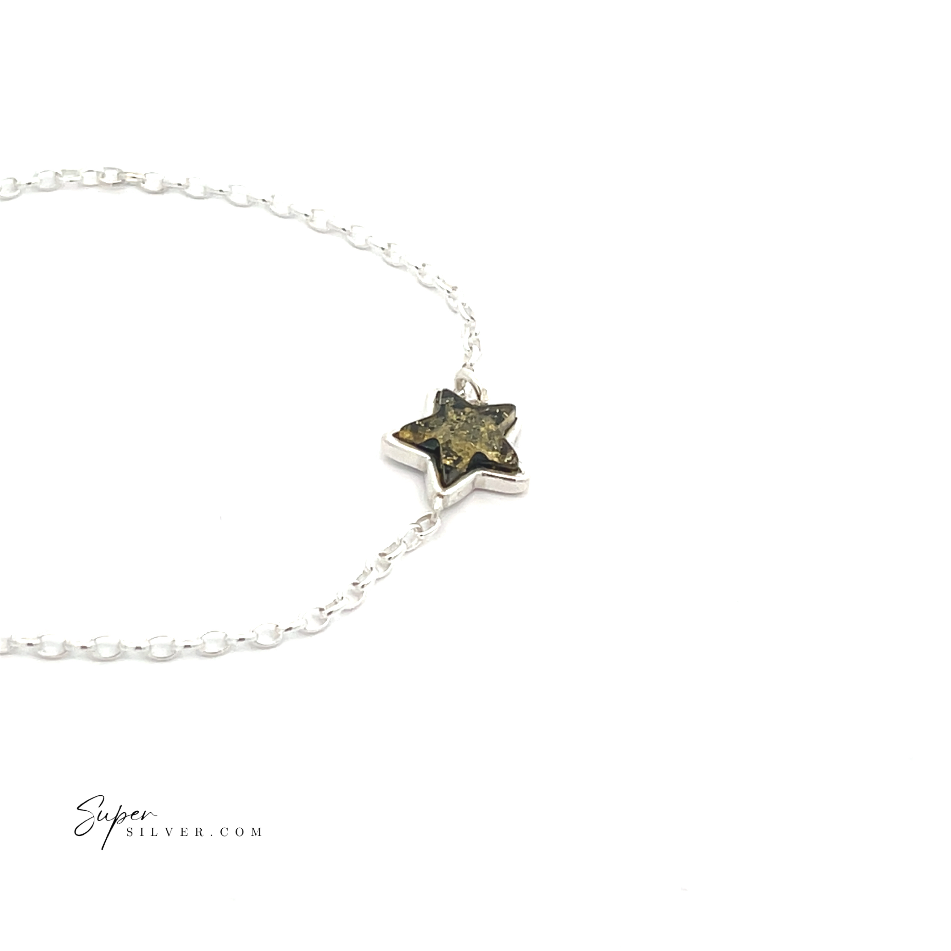 Introducing the Simple Amber Star Bracelet: a silver minimalist chain bracelet adorned with a celestial charm, featuring a star-shaped pendant with an eye-catching mottled dark green and gold design.