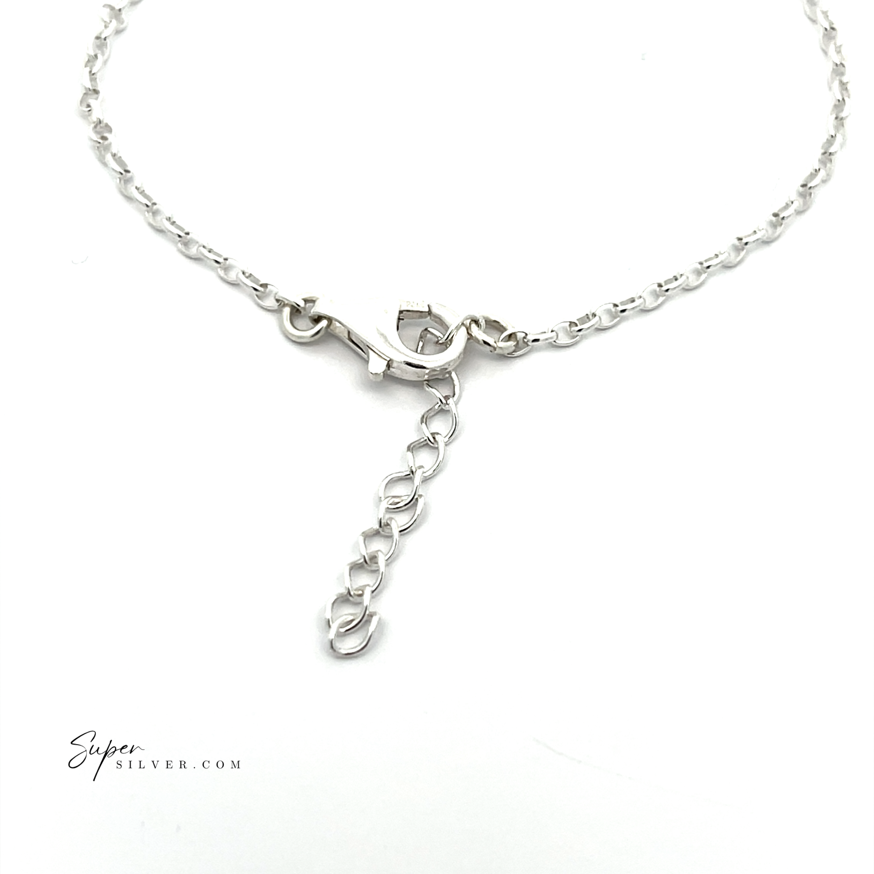 A minimalist Simple Amber Star Bracelet in sterling silver, featuring a lobster clasp and an extender chain, elegantly displayed on a white background.