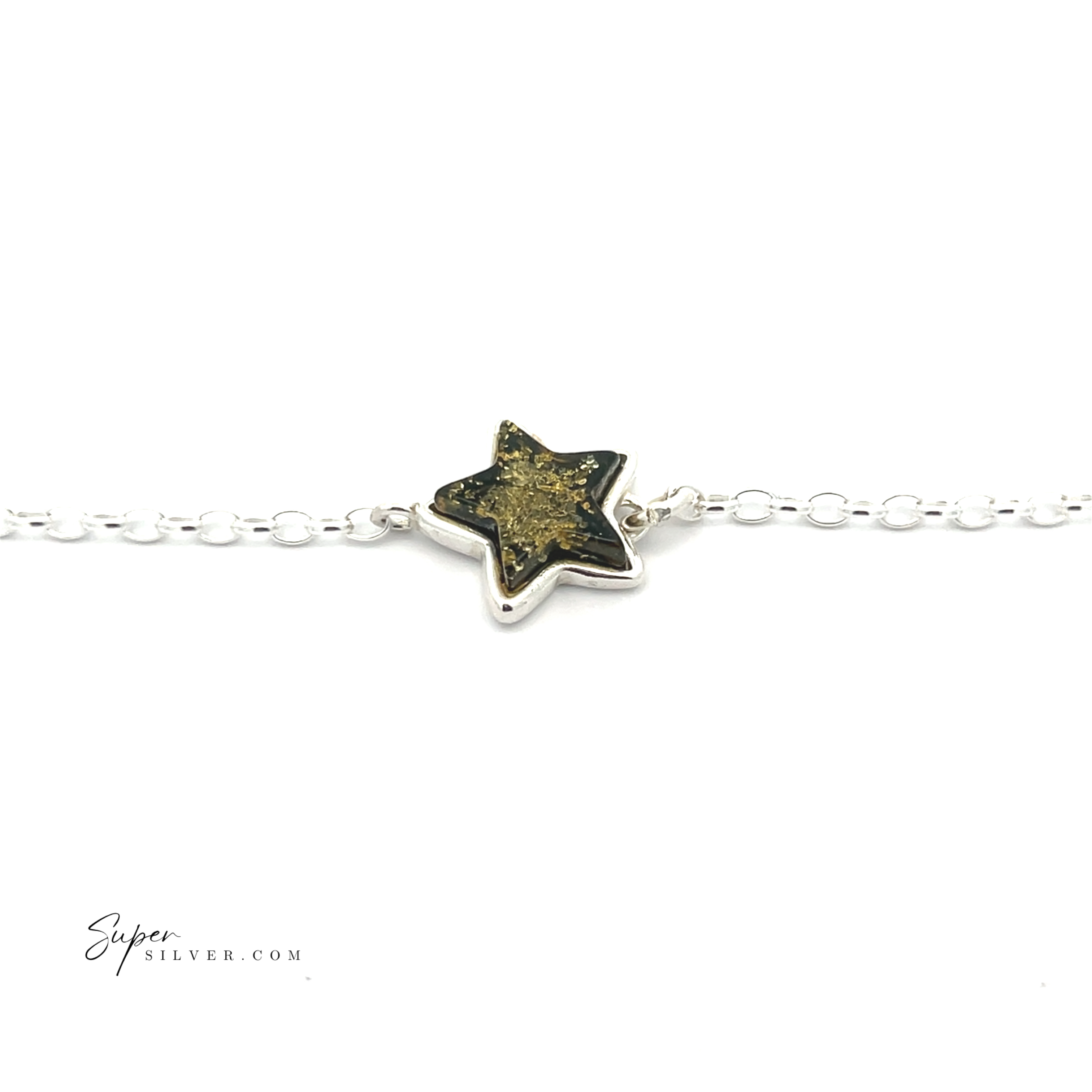 The Simple Amber Star Bracelet is a minimalist chain bracelet that showcases a sterling silver star-shaped charm, featuring an enamel center with black and gold on a white background.