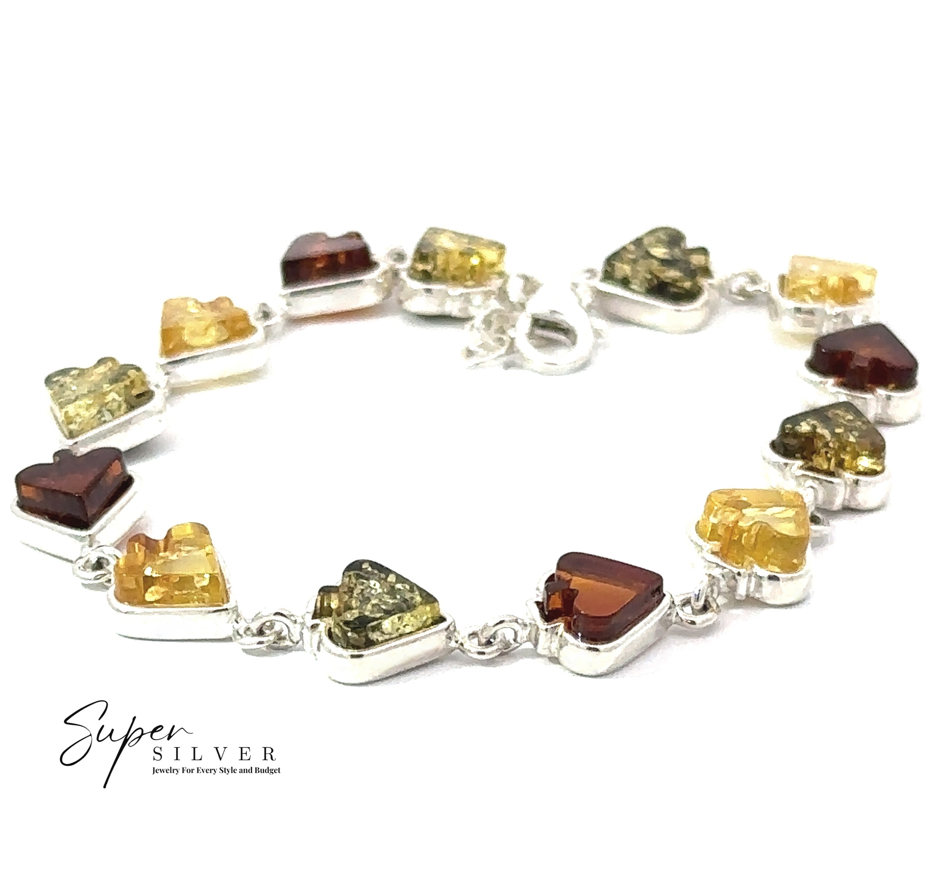 The Amber Card Suit Bracelets are sterling silver pieces showcasing alternating heart-shaped yellow, green, and brown amber stones, set against a white background with the "Super Silver" logo.