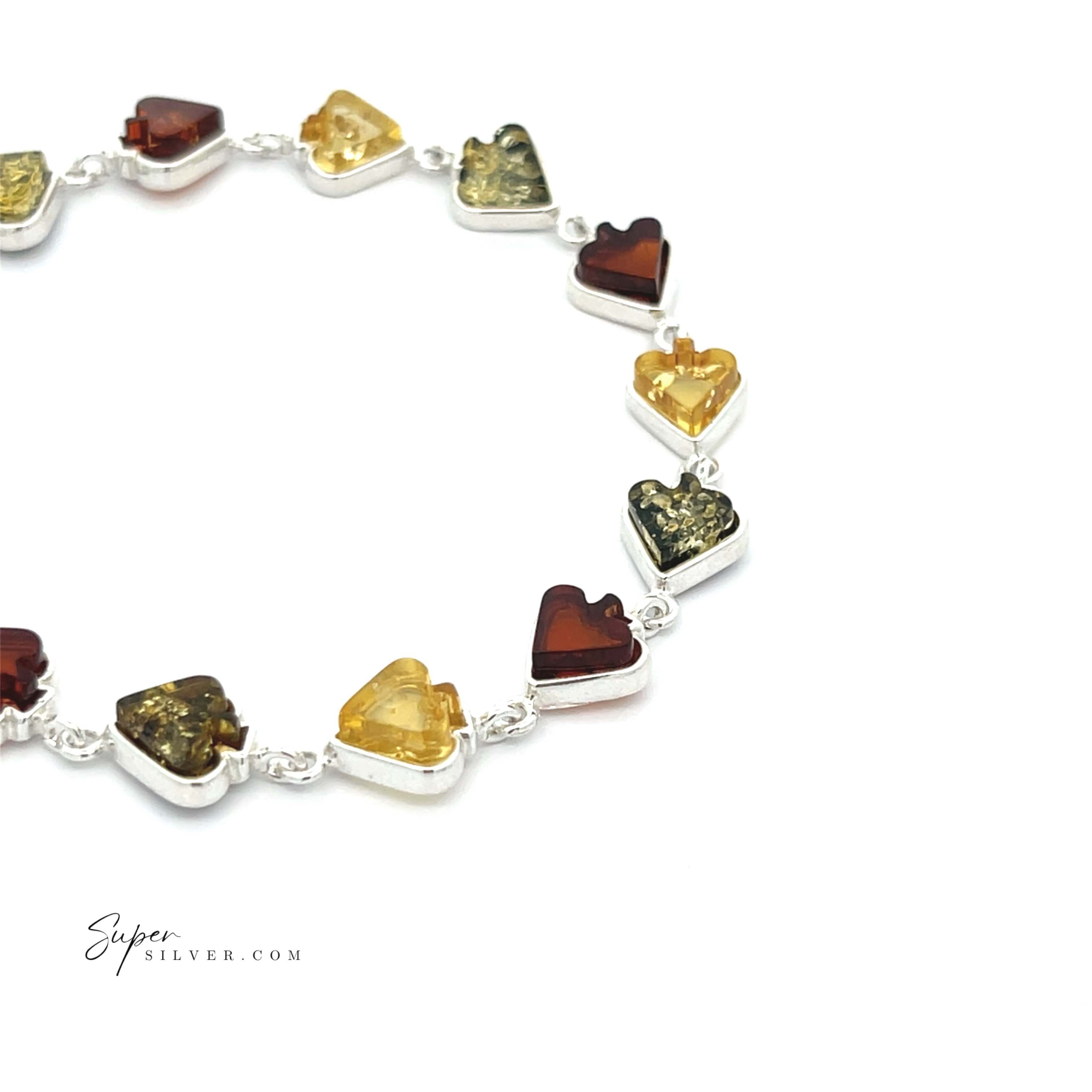The Amber Card Suit Bracelet features heart-shaped sterling silver links with alternating brown, yellow, and green Baltic amber stones, beautifully displayed on a white background.