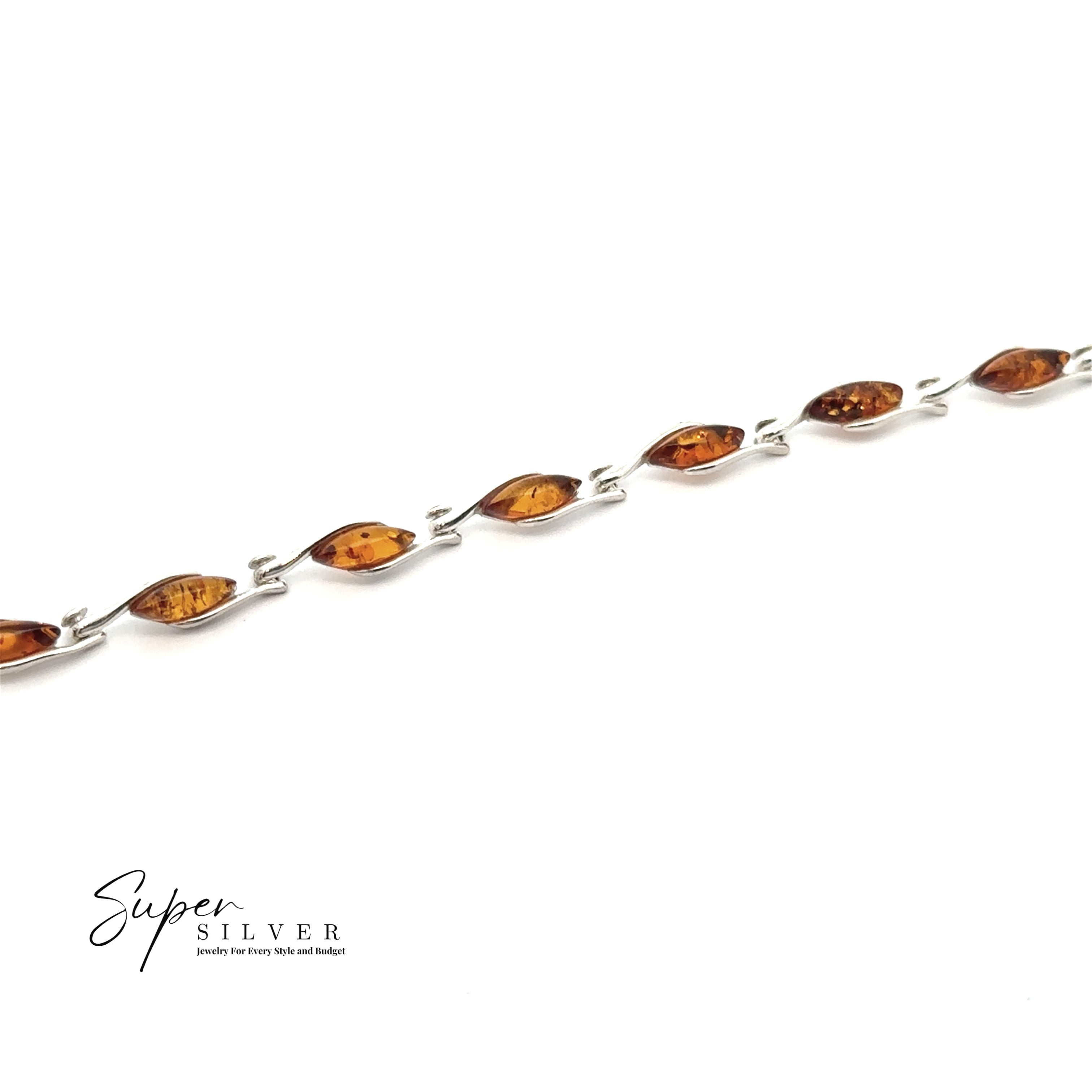 The Baltic Amber Marquise Bracelet showcases marquise-shaped cognac amber stones set in sterling silver, evenly spaced on the chain against a white background with the "Super Silver" logo in the corner.