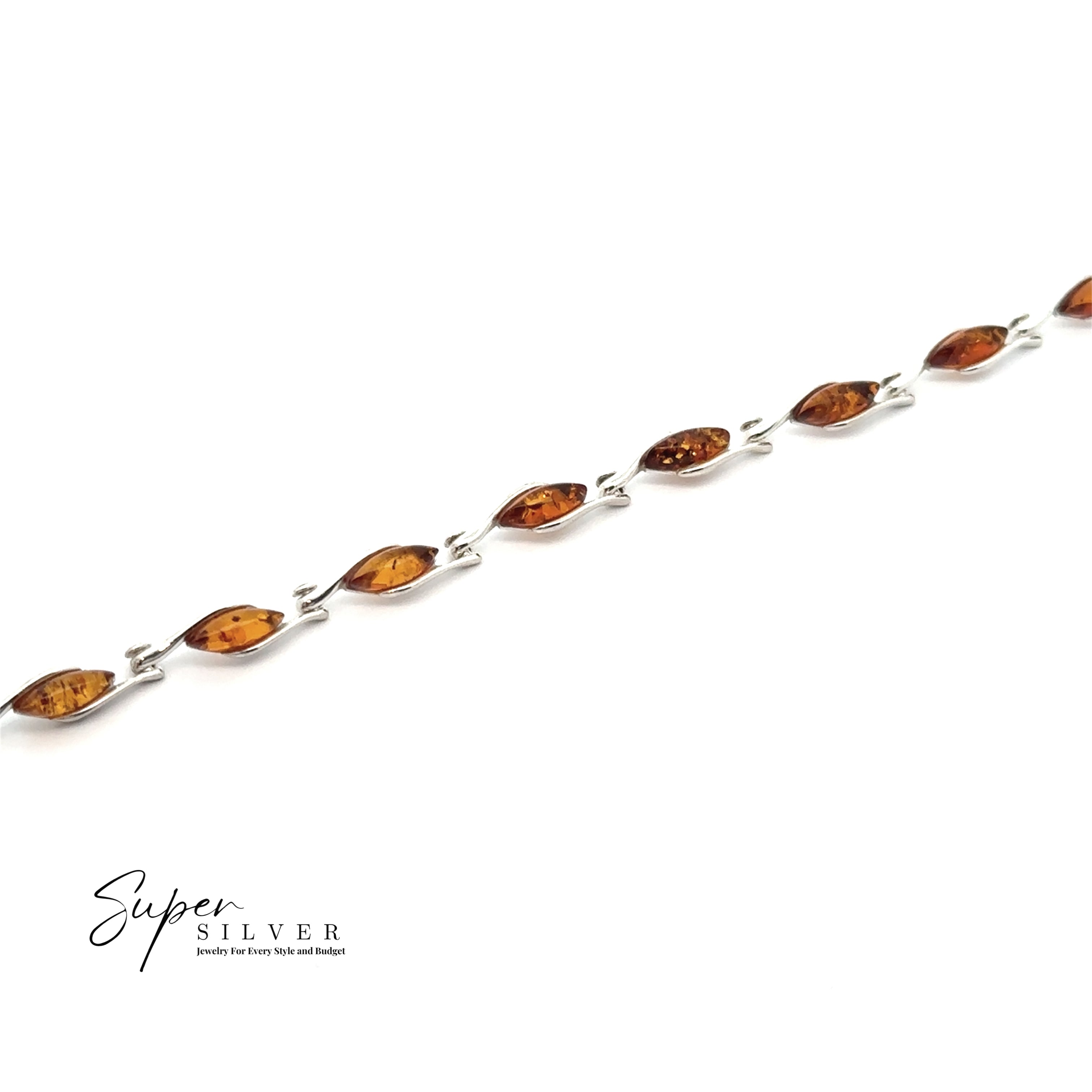 The Baltic Amber Marquise Bracelet, a sterling silver chain with marquise-shaped cognac amber stones, is shown on a white background with the "Super Silver" brand logo in the bottom left corner.